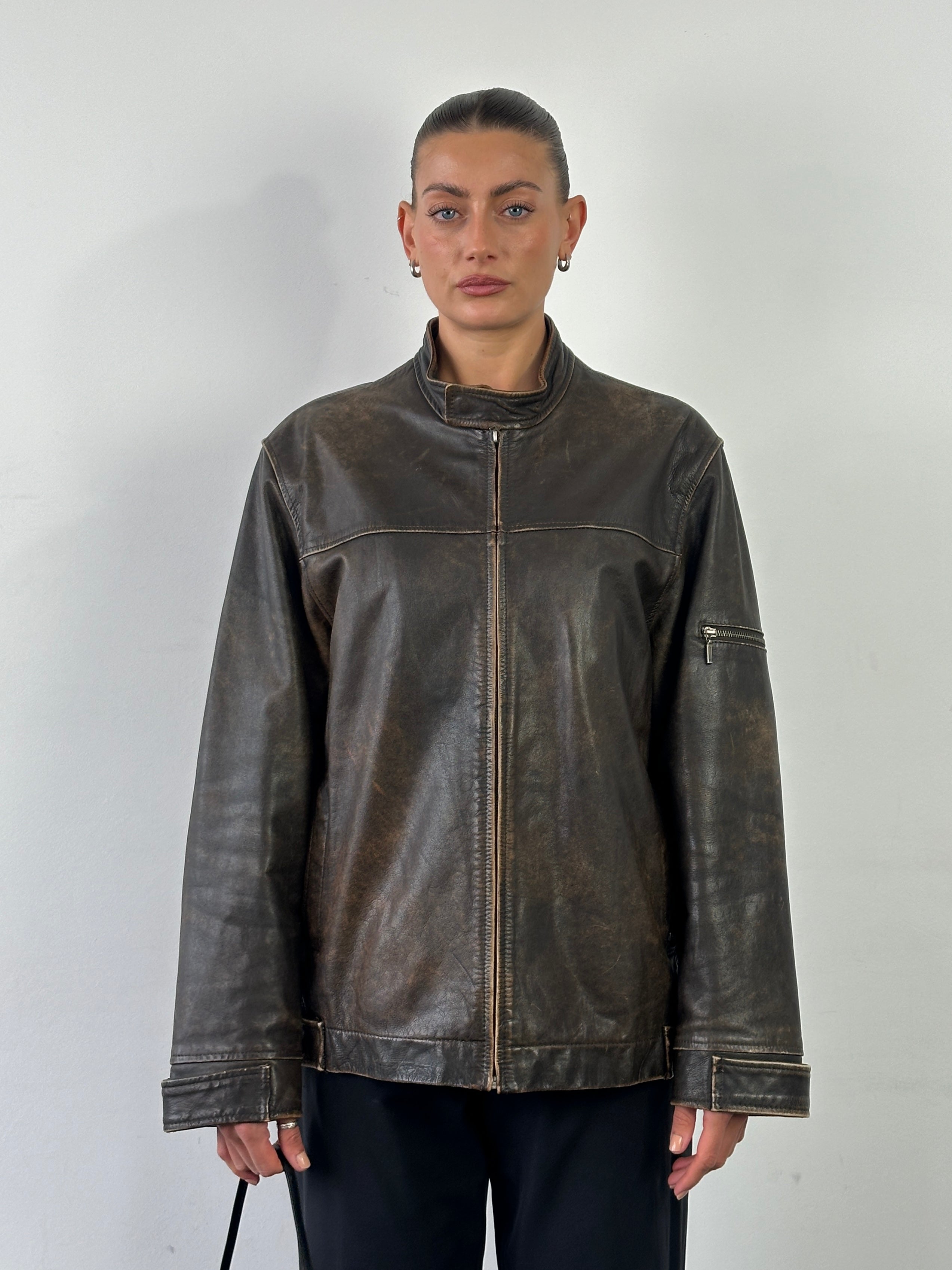 Vintage Moto aged leather jacket in size L, featuring distressed leather and classic motorcycle style.