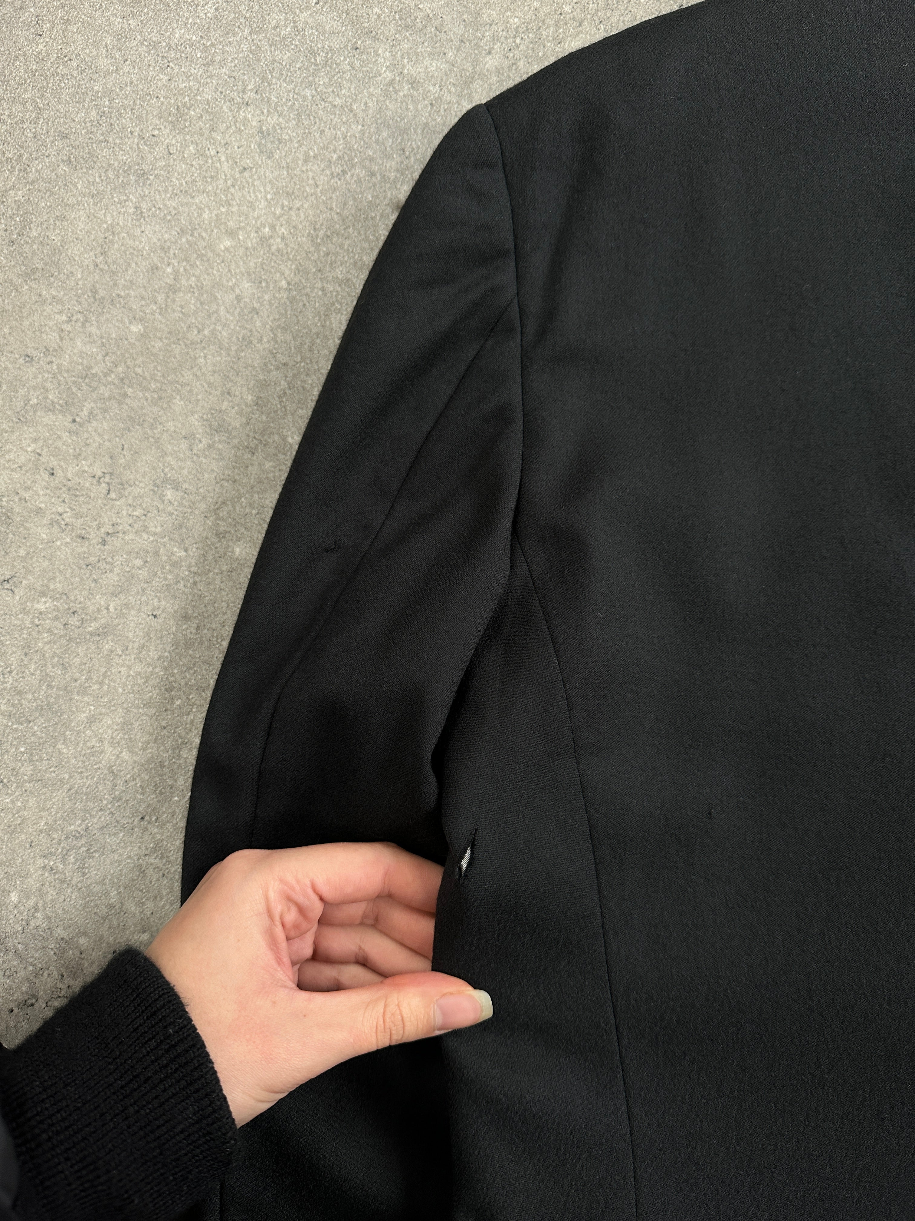 Vintage Japanese 1990s pure wool straight-leg suit in size 40R/W26, shown on a hanger with a neutral background.