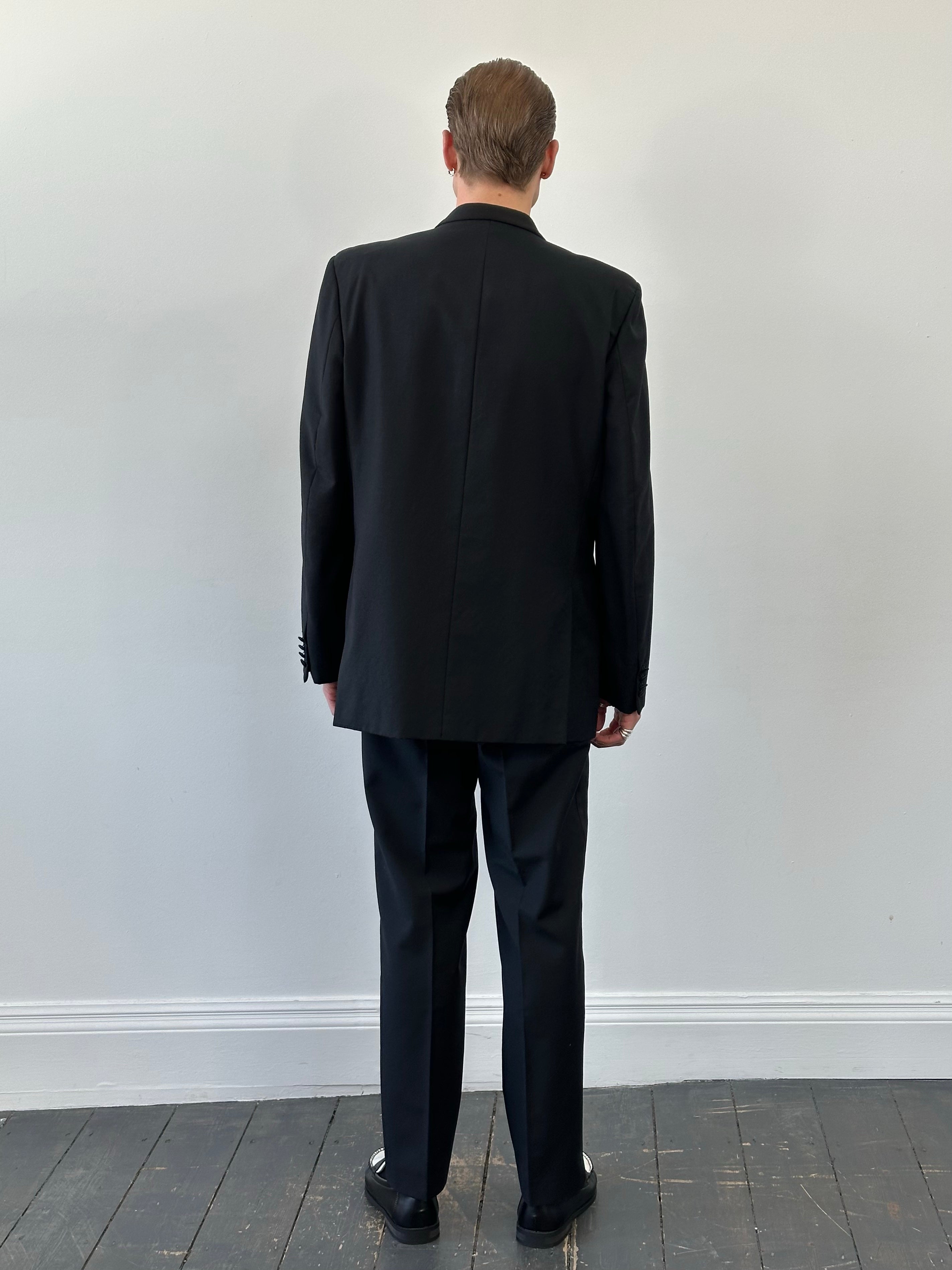 Pierre Cardin 1980s pure wool tuxedo suit in navy with shawl collar, featuring tailored lapels and classic fit.