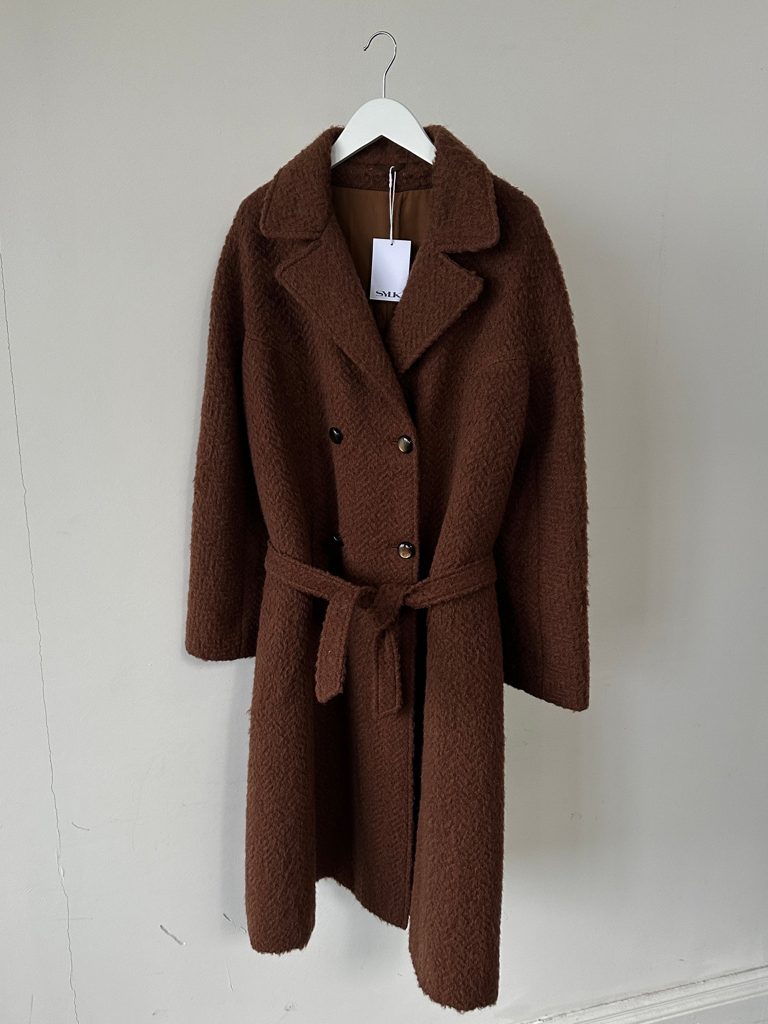 Vintage Italian vintage mohair wool double-breasted belted coat in S/M, showcasing classic style and textured fabric.
