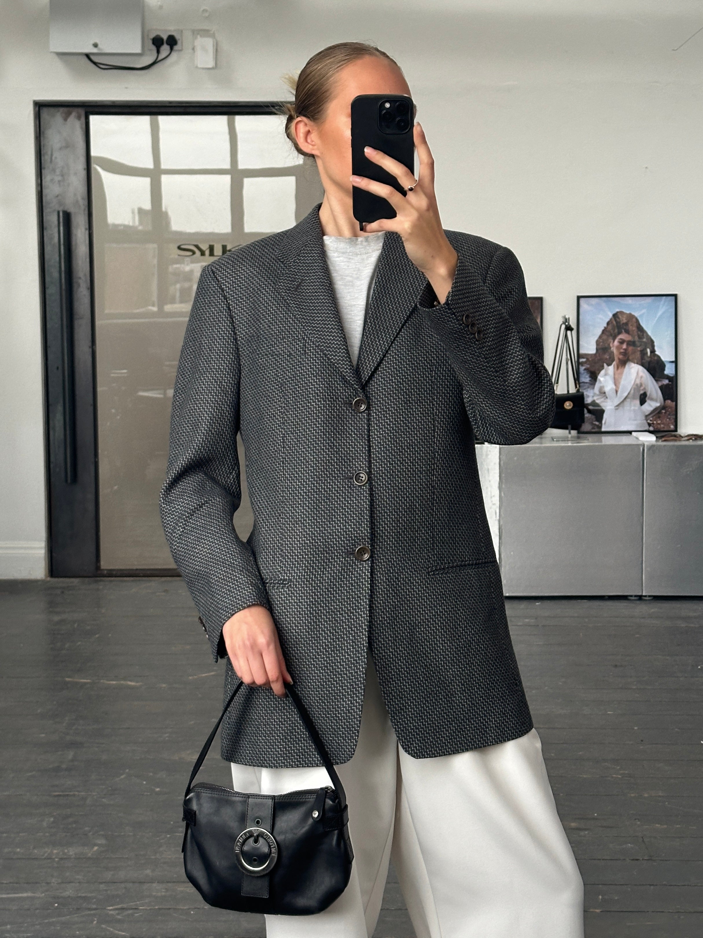 Armani Collezioni 1990s pure wool woven blazer in size 38R/M, shown in a classic tailored fit with structured lapels and woven fabric texture.