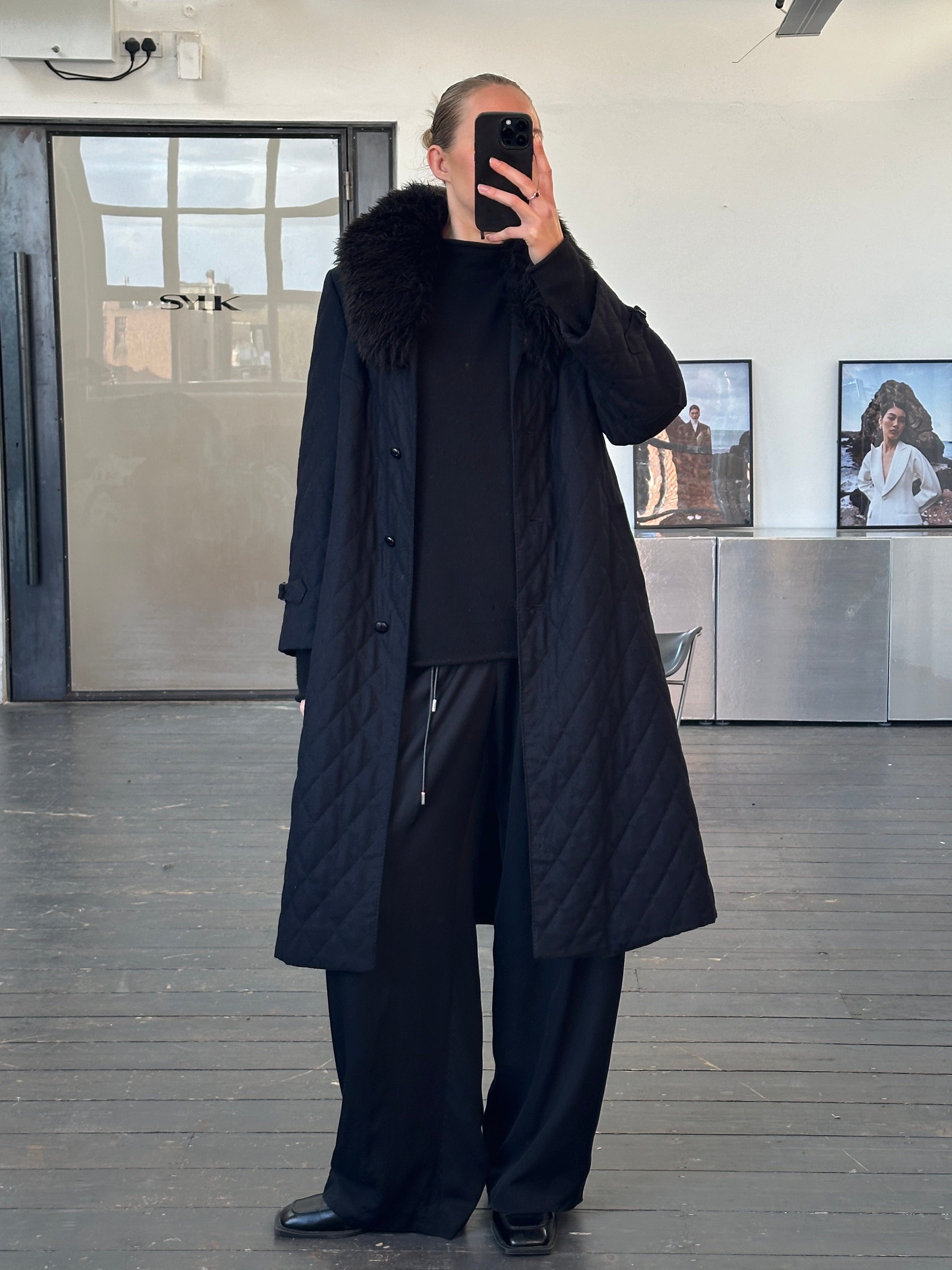 Vintage 1990s wool quilted coat with fur collar, medium size, featuring classic design and warm winter style.