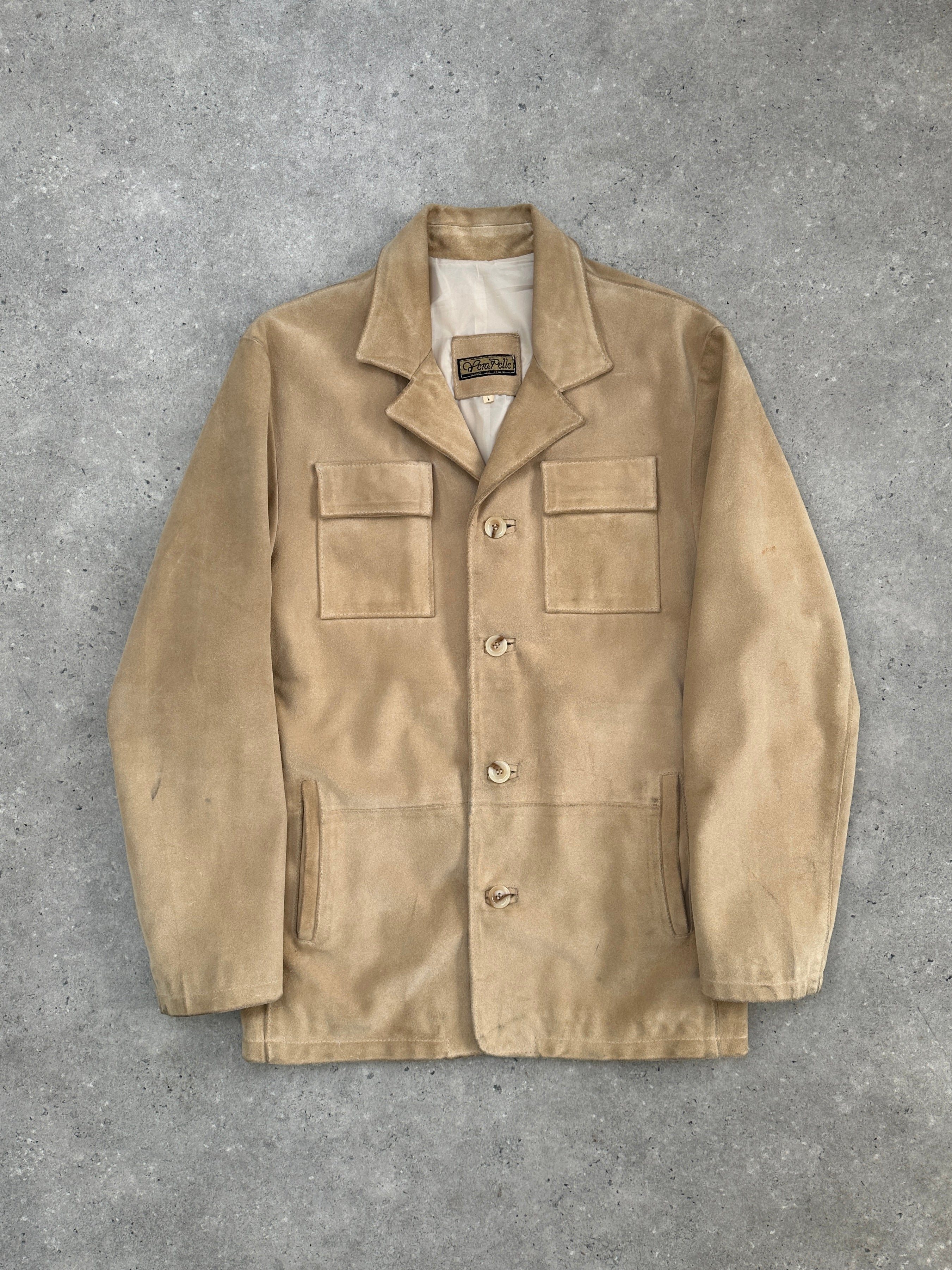 Vintage Italian vintage suede jacket in size large, featuring classic design and soft brown suede material.