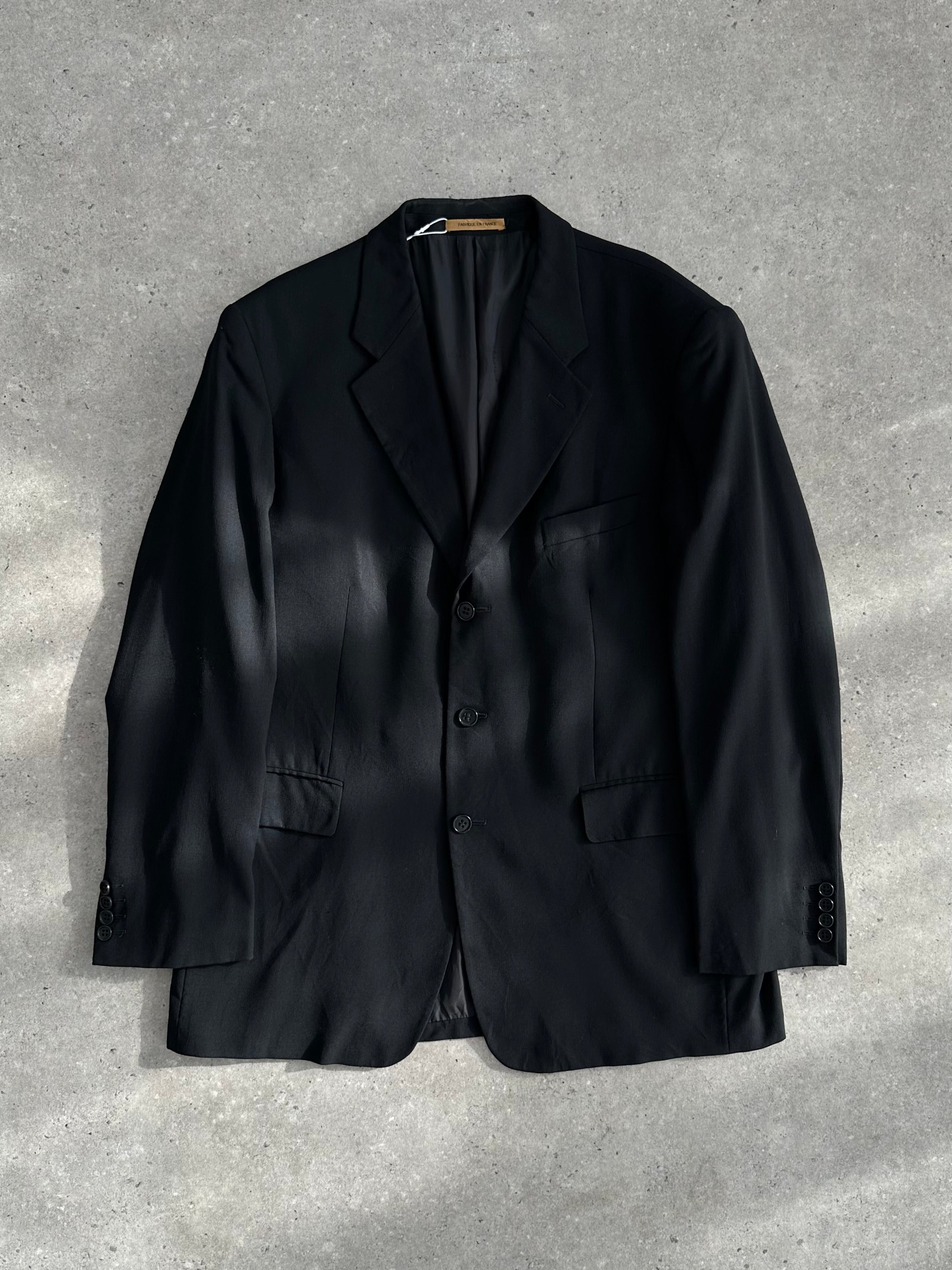 Yves Saint Laurent 1990s pure wool single-breasted blazer in size 46R/XXL, shown on a hanger with classic tailored style.