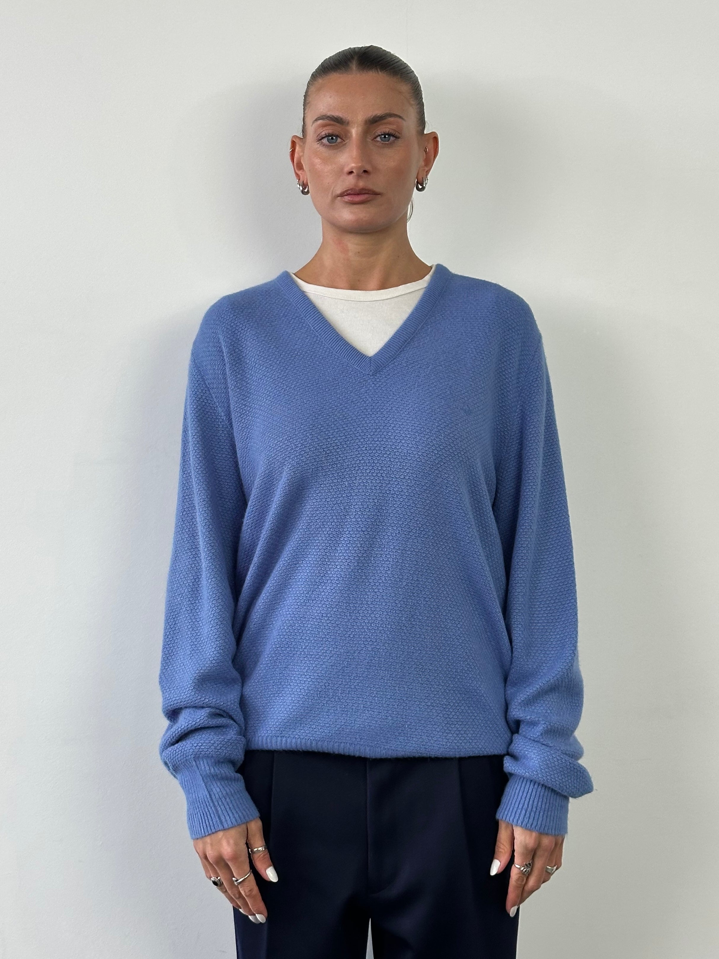Christian Dior 1980s V-neck knitted logo jumper in size L, featuring classic Dior branding and cozy knit fabric.