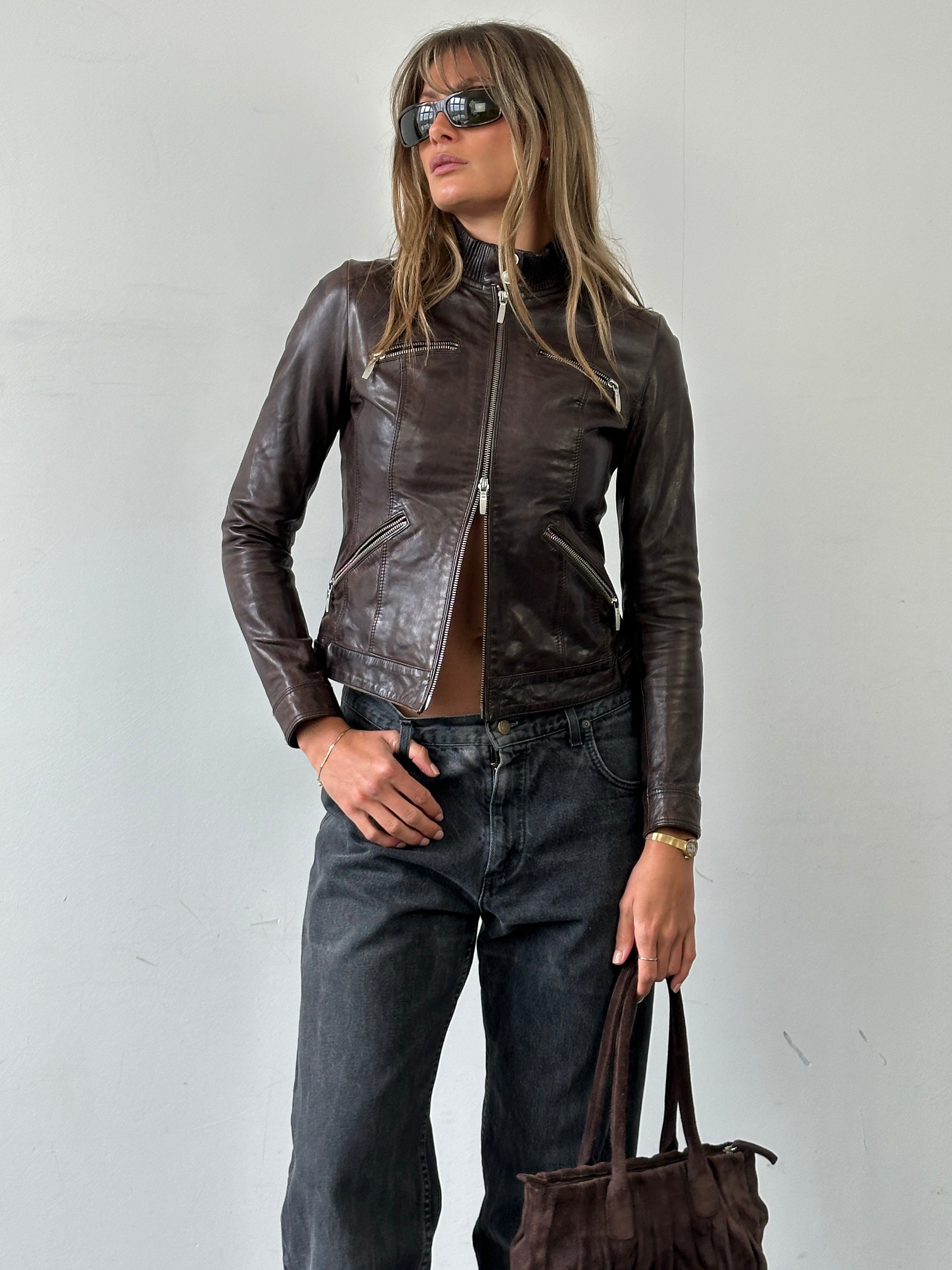 Vintage double zip fitted biker leather jacket in XS/S, stylish women's motorcycle jacket with classic design and durable leather.