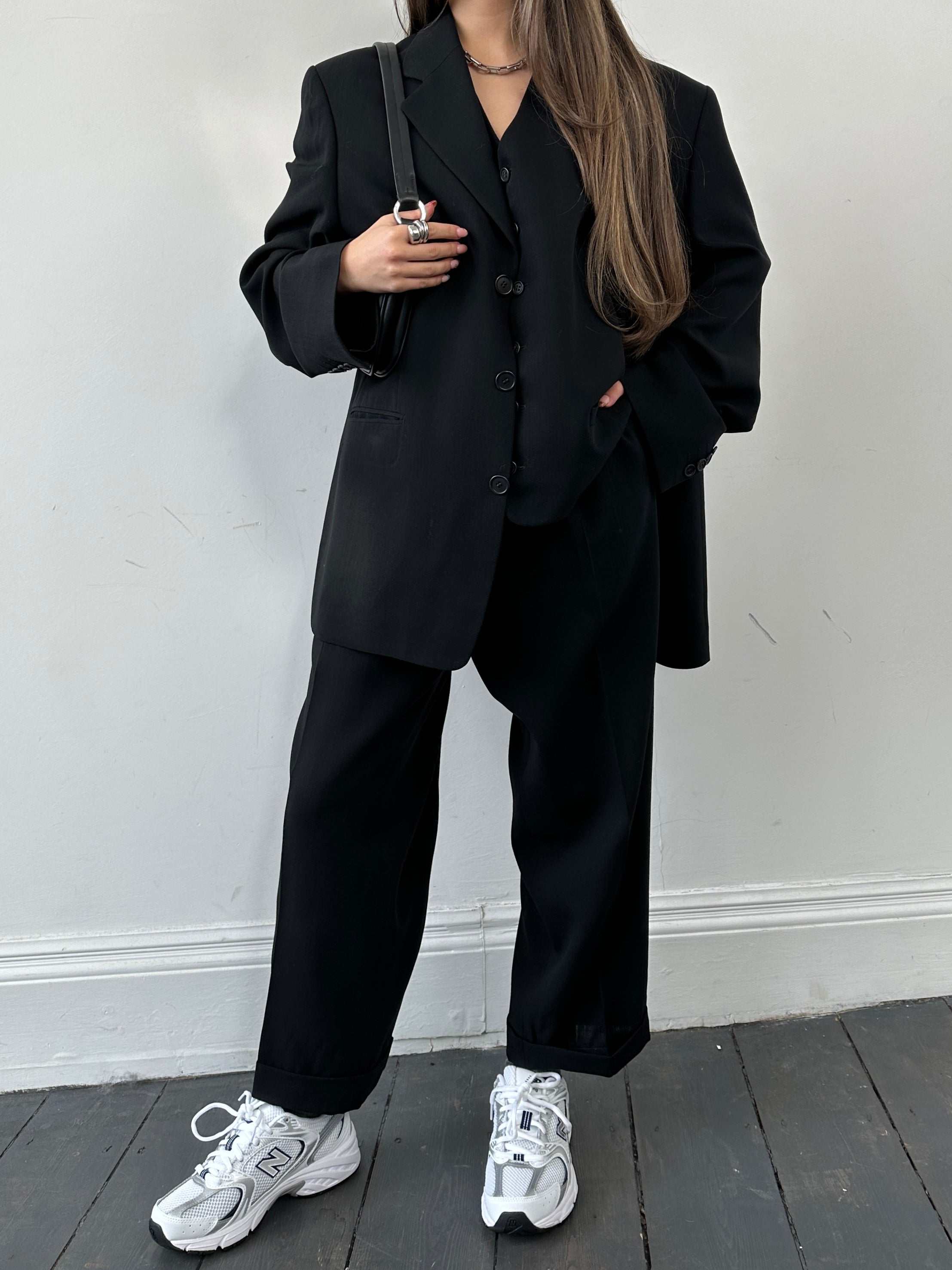 Yves Saint Laurent wool three-piece suit in size 40S, featuring a tailored jacket, vest, and matching trousers in classic style.