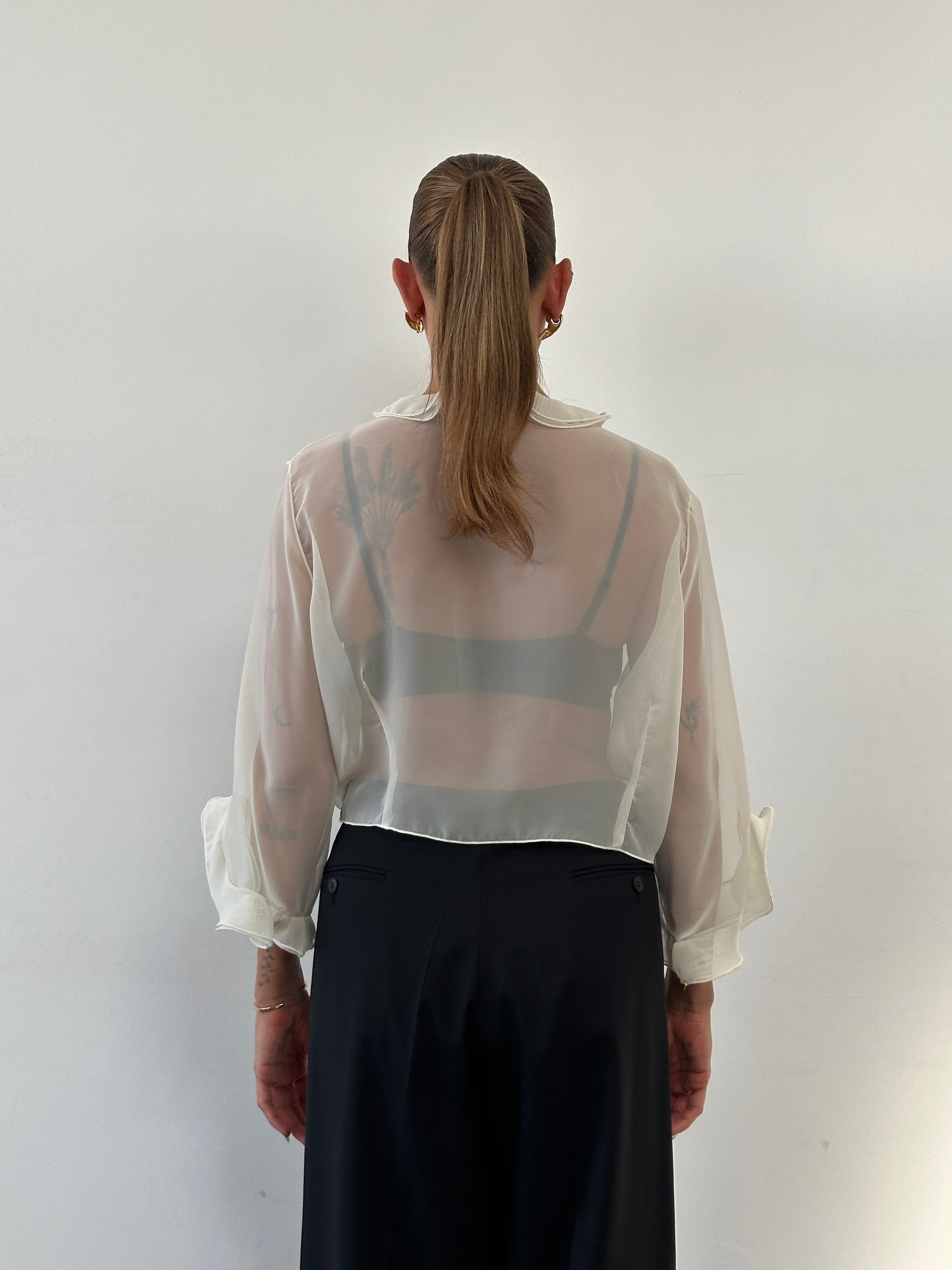 Vintage Italian sheer blouse with frill tie-front, available in sizes S to XL, showcasing elegant vintage shirt style.