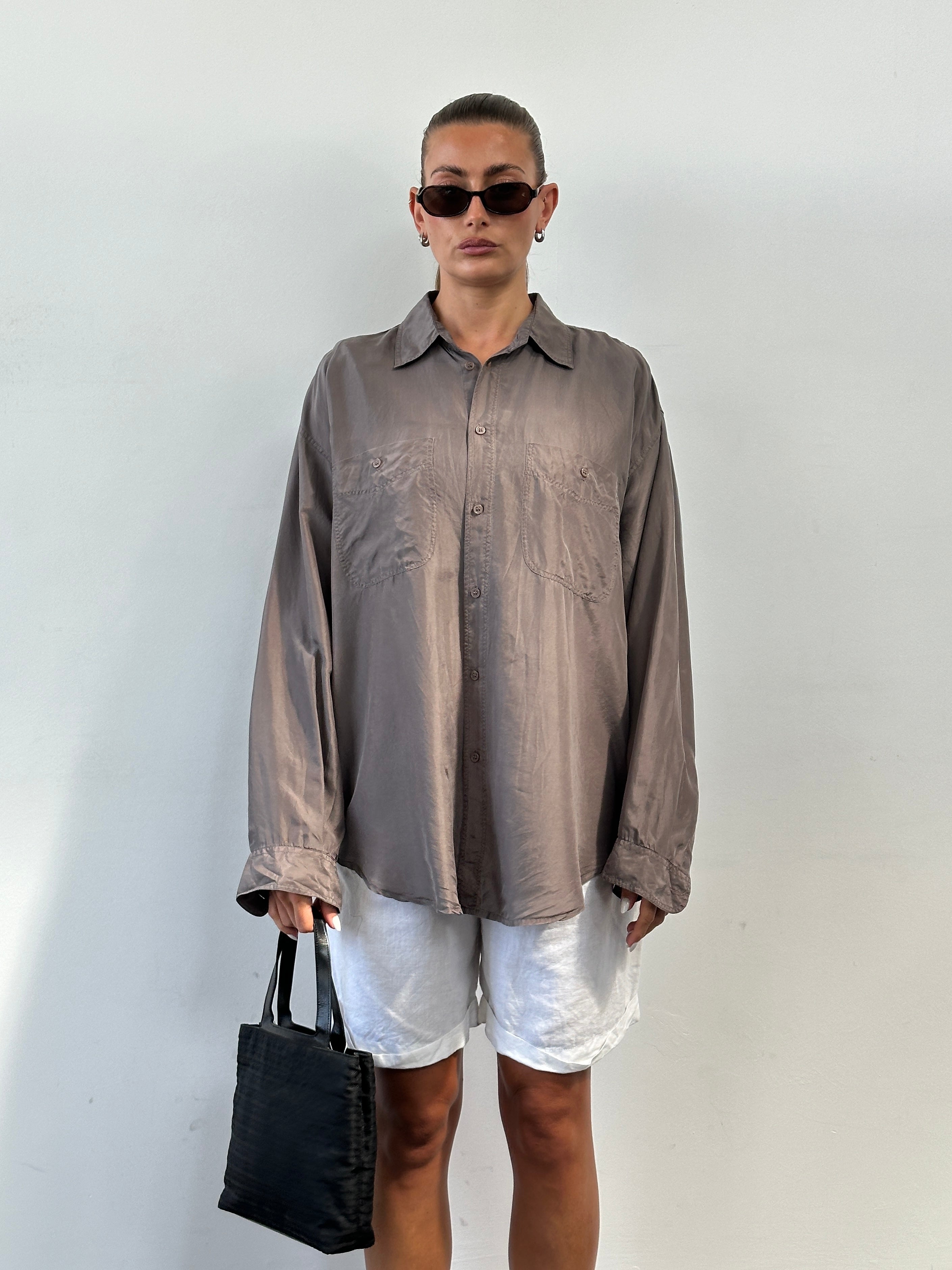 Vintage pure silk shirt in XL size, with a classic design and smooth fabric, displayed on a plain background.