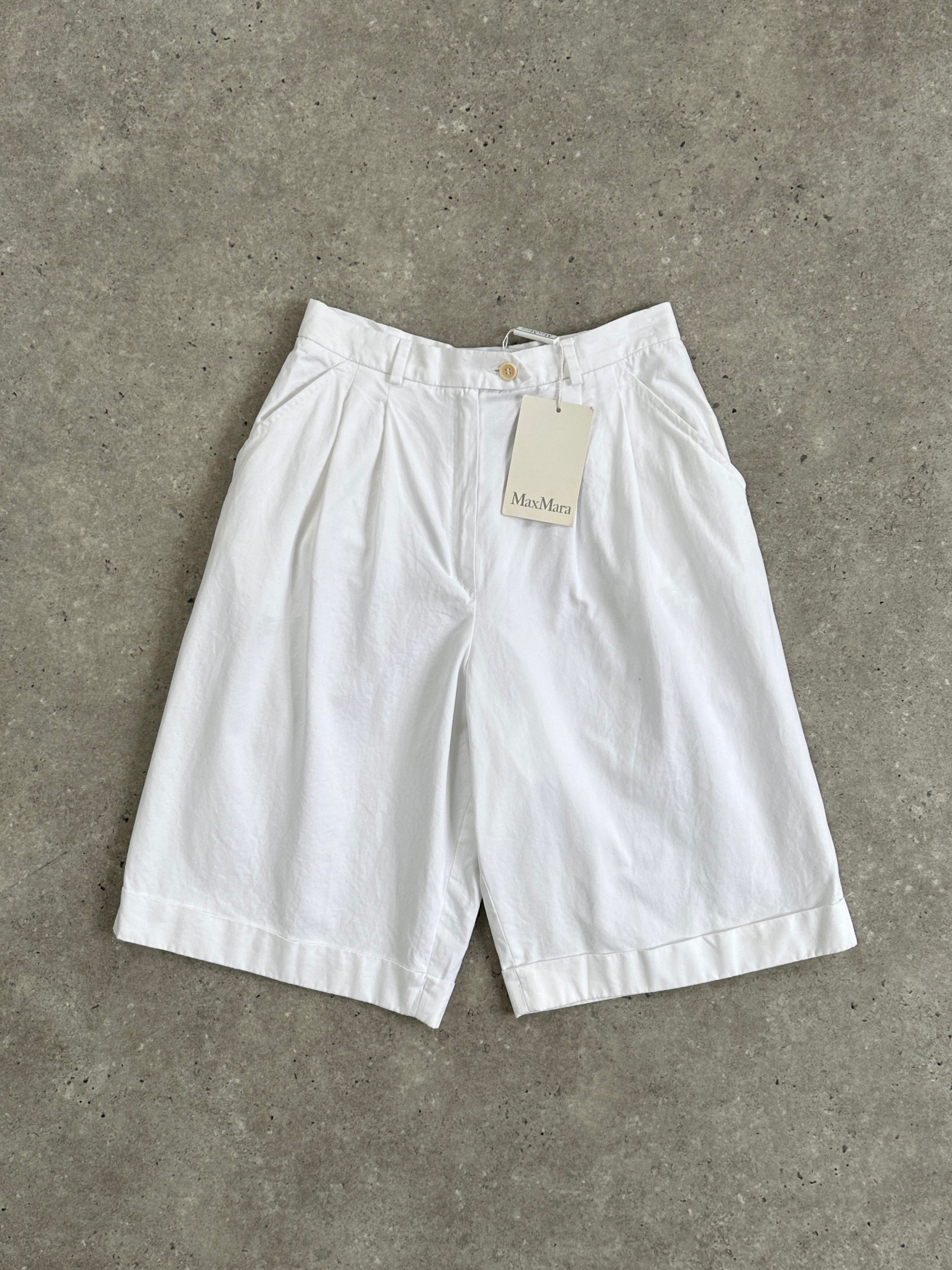Max Mara pure cotton high-waisted Bermuda shorts in W26, displayed on a hanger with a neutral background.