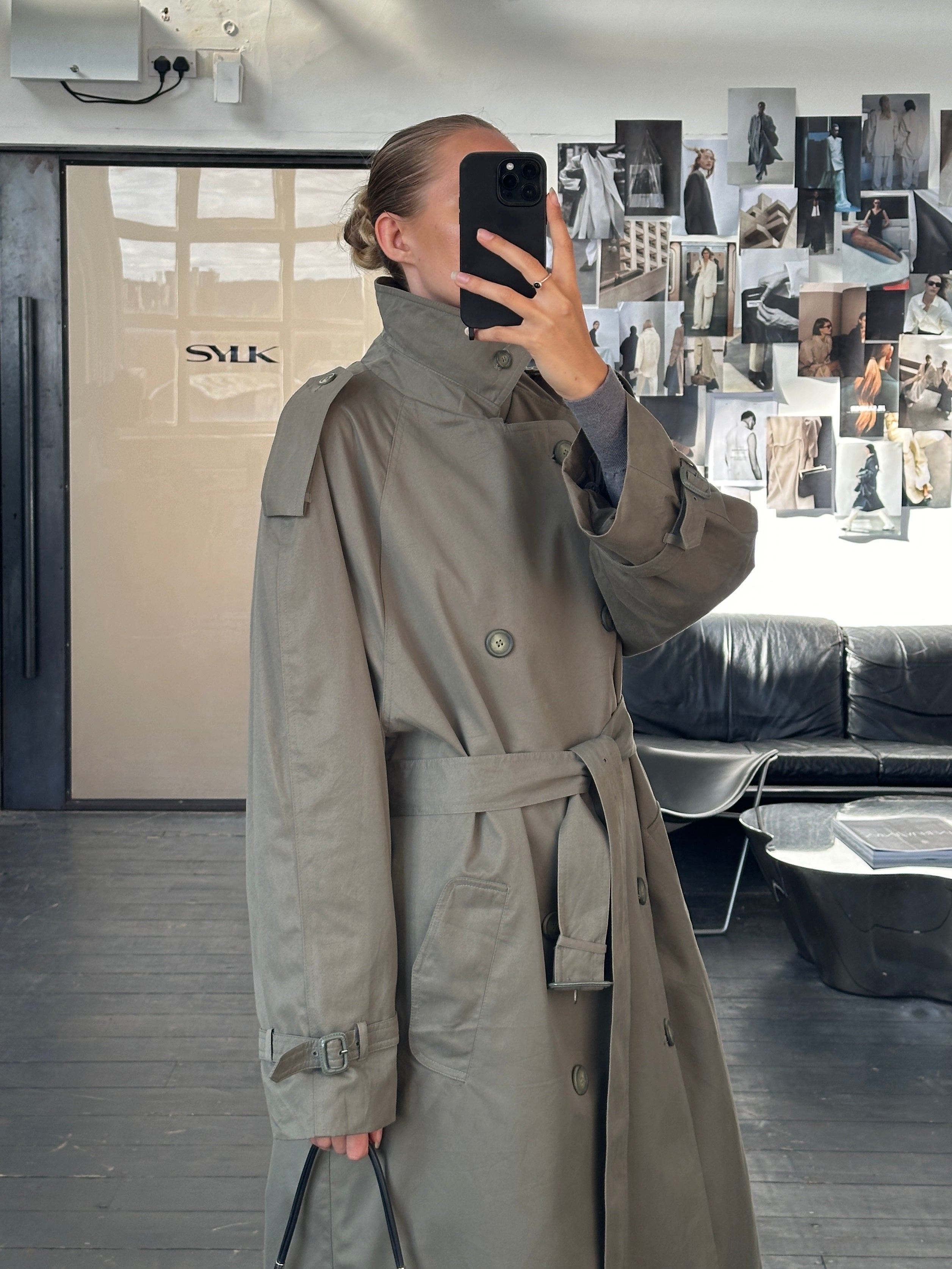 London Fog 1980s high neck belted trench coat in XXL, showing classic beige fabric, high collar, and belted waist detail.