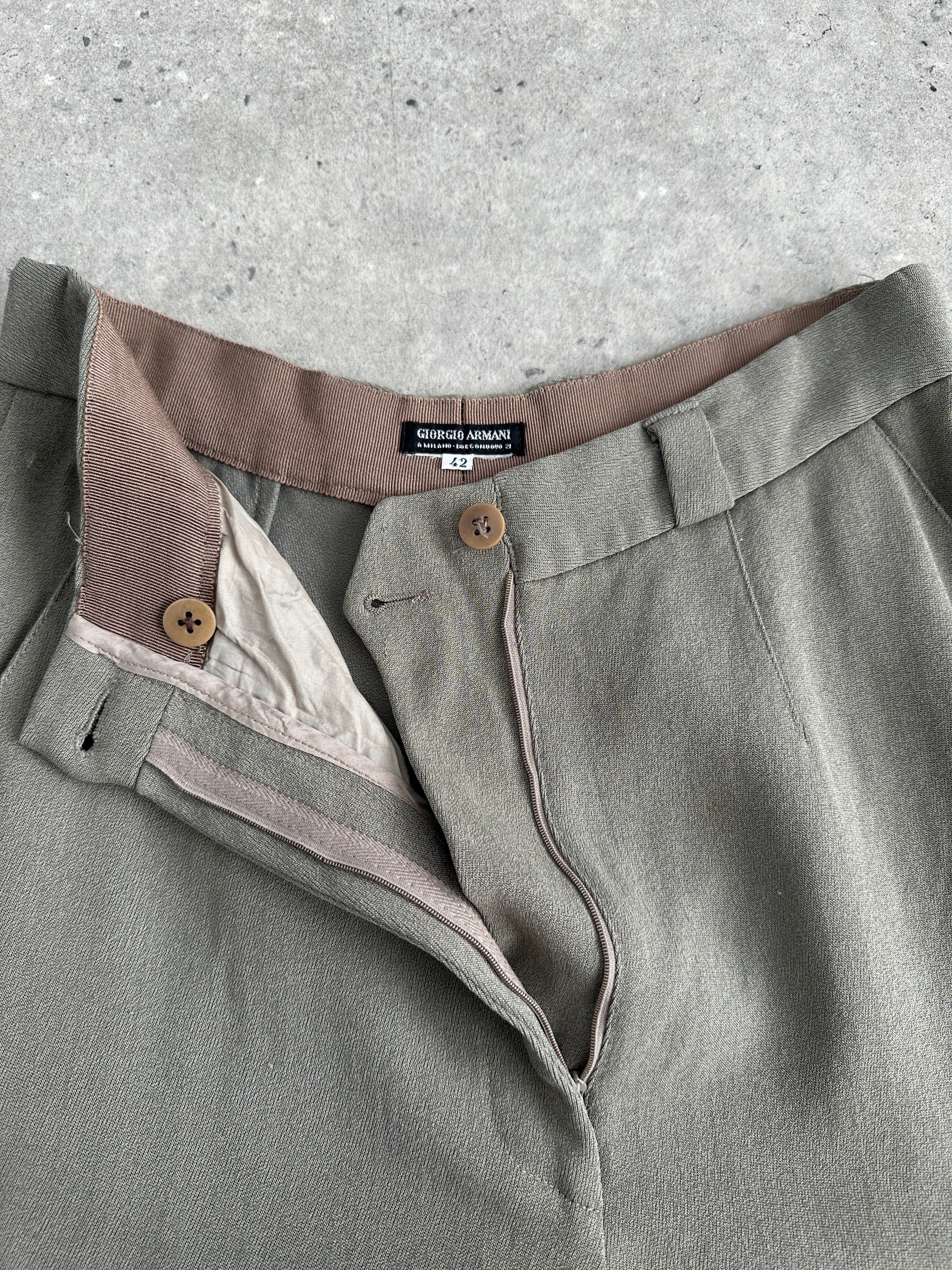 Giorgio Armani high waisted tapered leg trousers in W24, tailored fit, with sleek fabric and classic design.