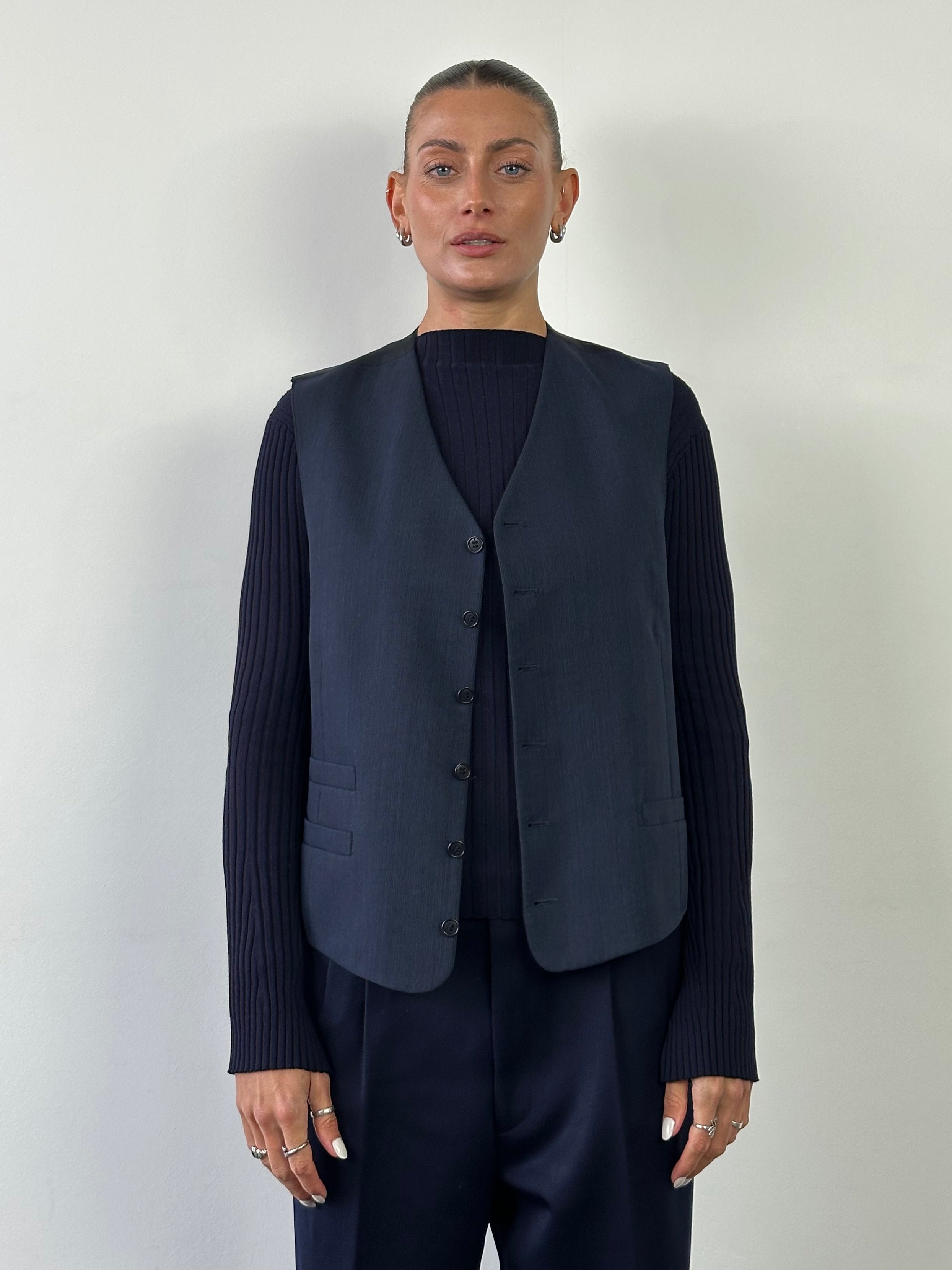 Yves Saint Laurent Pour Homme wool tailored waistcoat in size 42R/L, stylish men's formal vest with a classic fit.