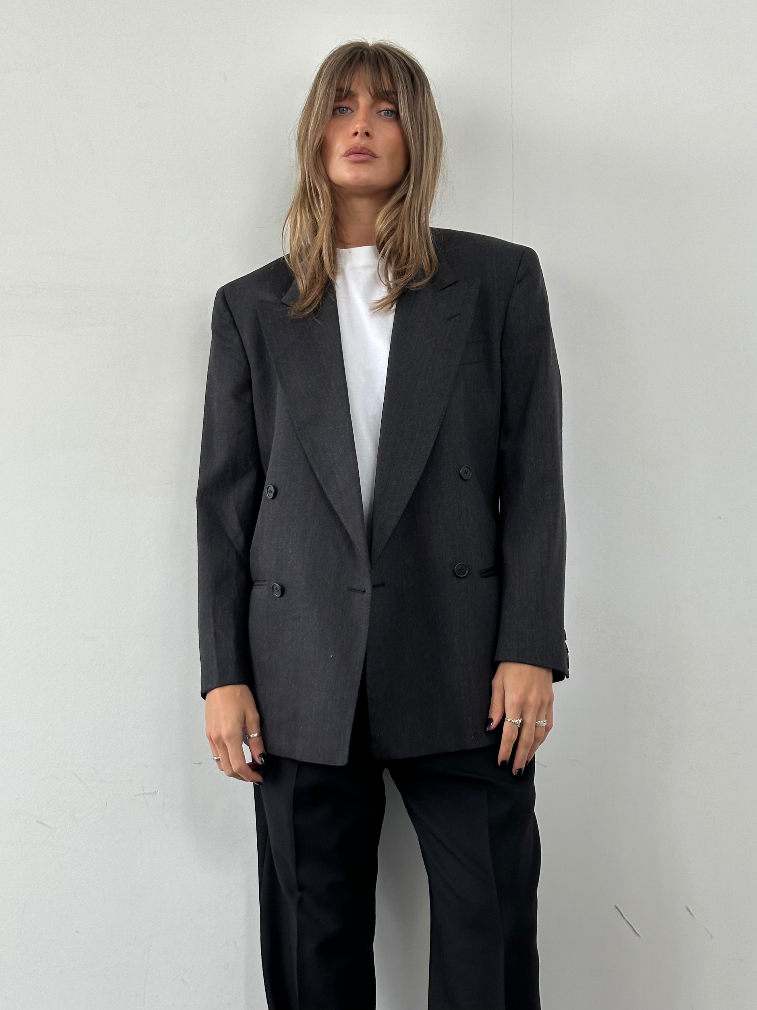 Valentino Virgin Wool Double Breasted Blazer in size 36R/S, tailored fit with classic lapels and structured design.