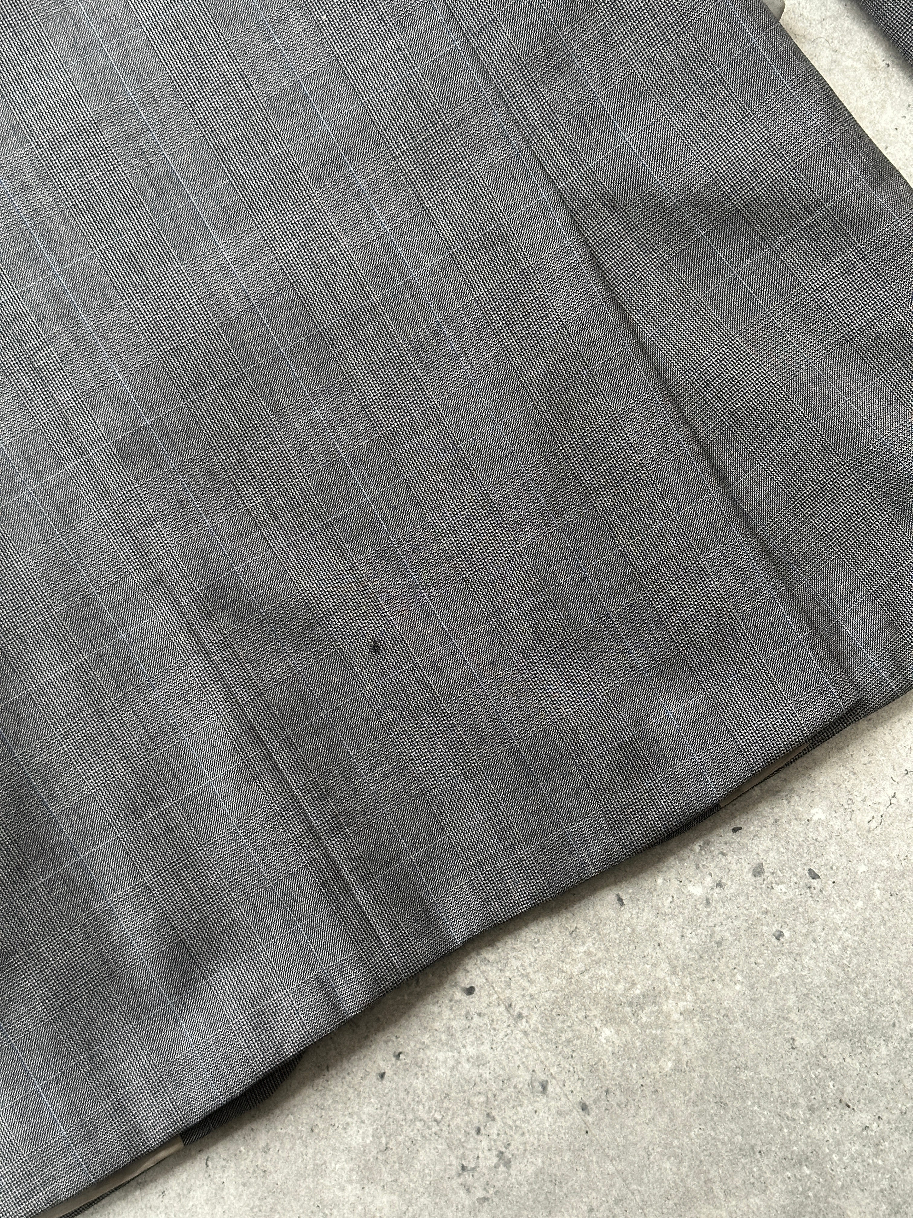 Yves Saint Laurent Pour Homme 1990s pure wool single-breasted blazer in size 40R/L, displayed on a hanger with a classic fit.