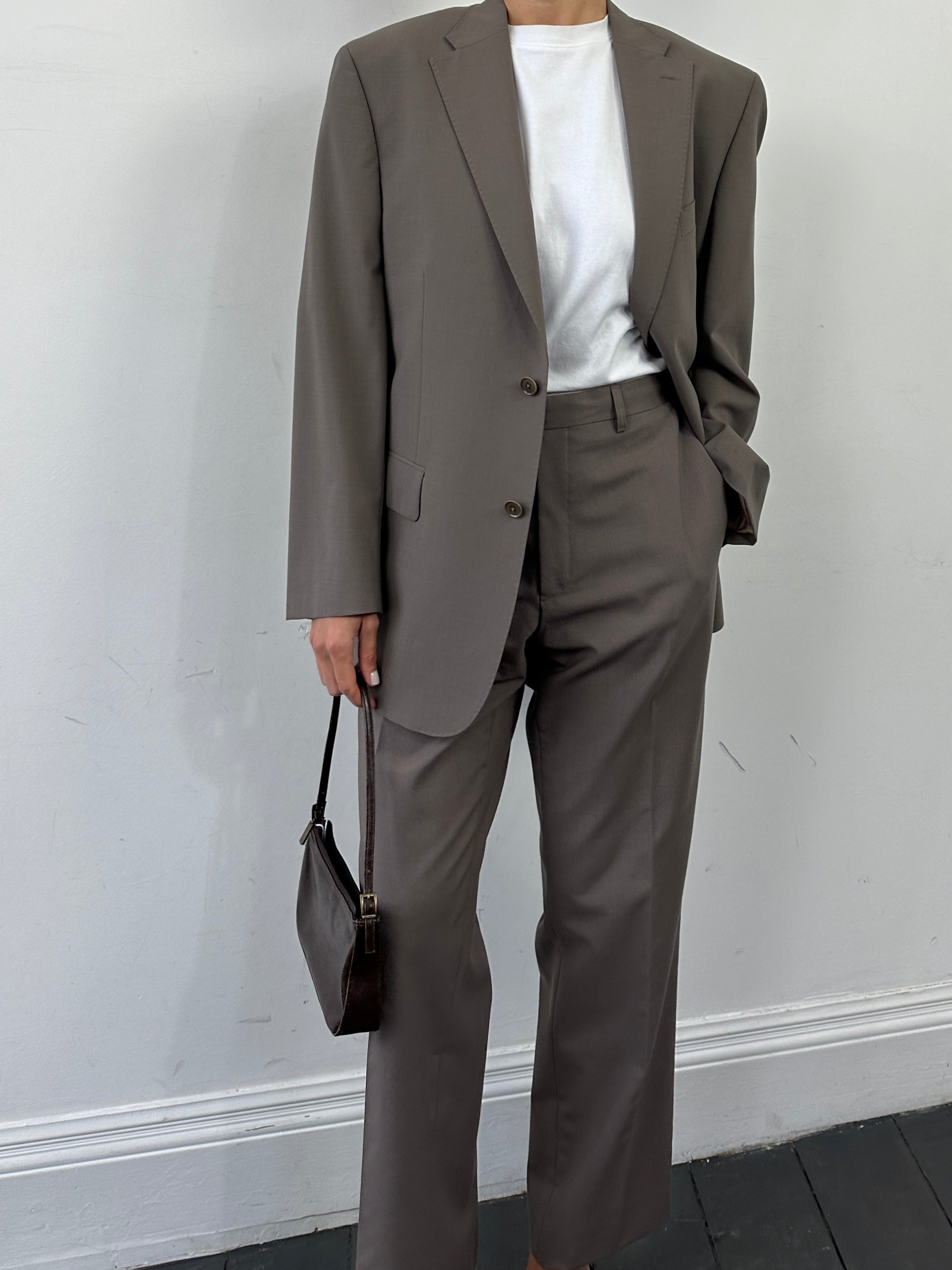 Vintage wool vintage jumpsuit with single-breasted design, size 42S/W34, featuring a classic tailored fit.