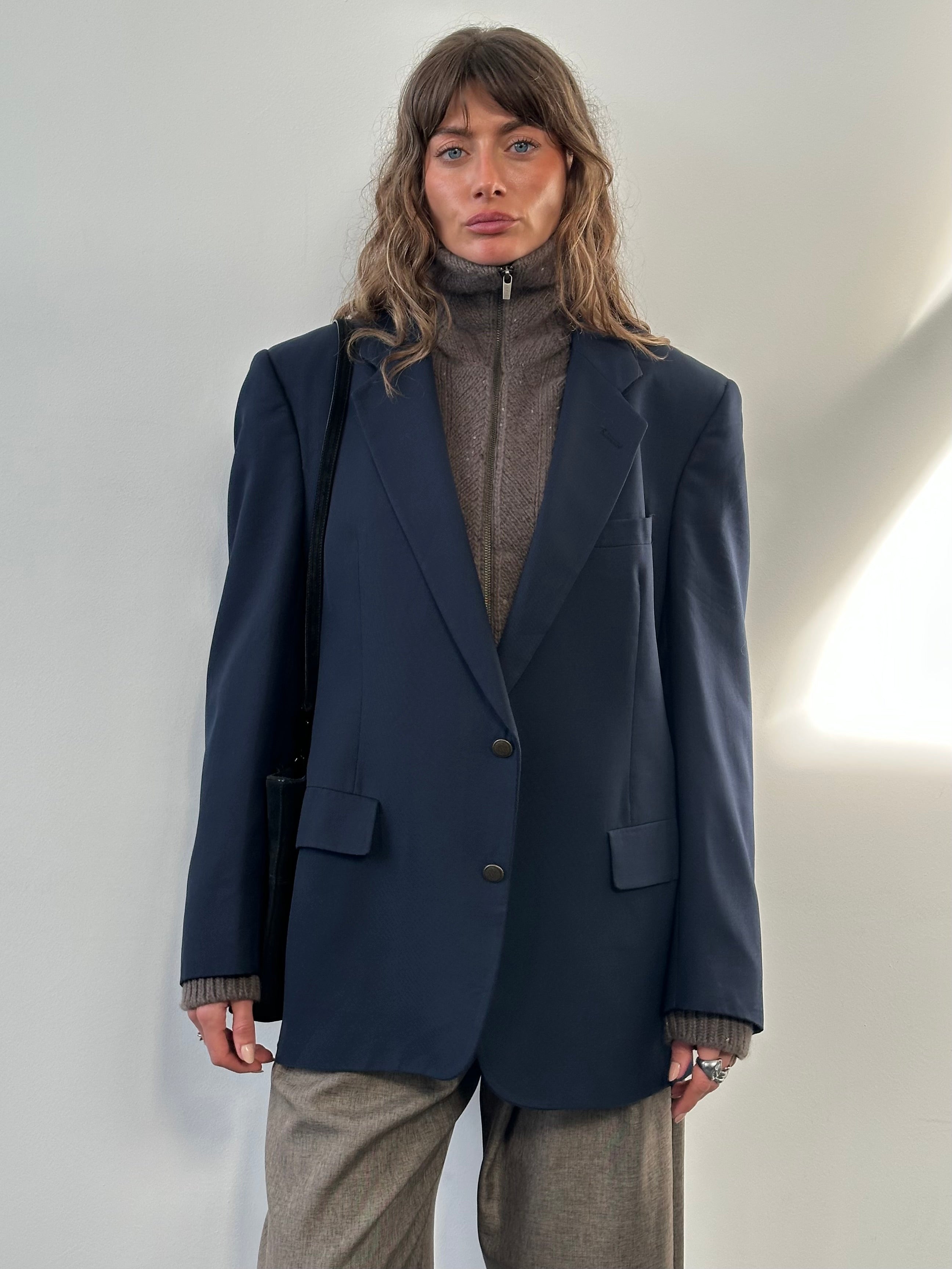 Christian Dior Monsieur 1990s pure wool single-breasted blazer in size 44R/XL, shown on a hanger with classic tailored fit.