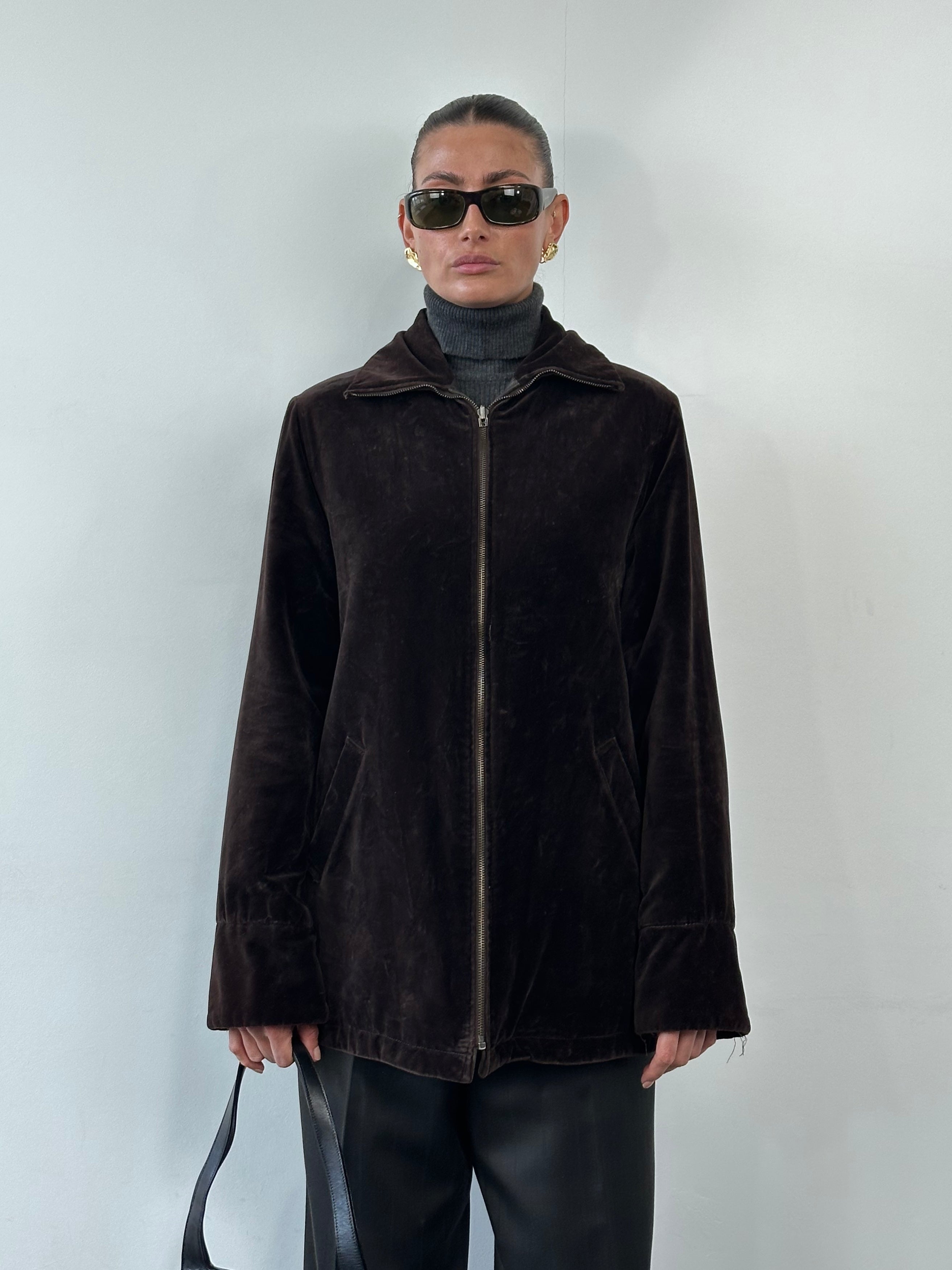 Kenneth Cole 1990s reversible leather and velvet jacket in size M, showing both the sleek leather side and plush velvet interior.