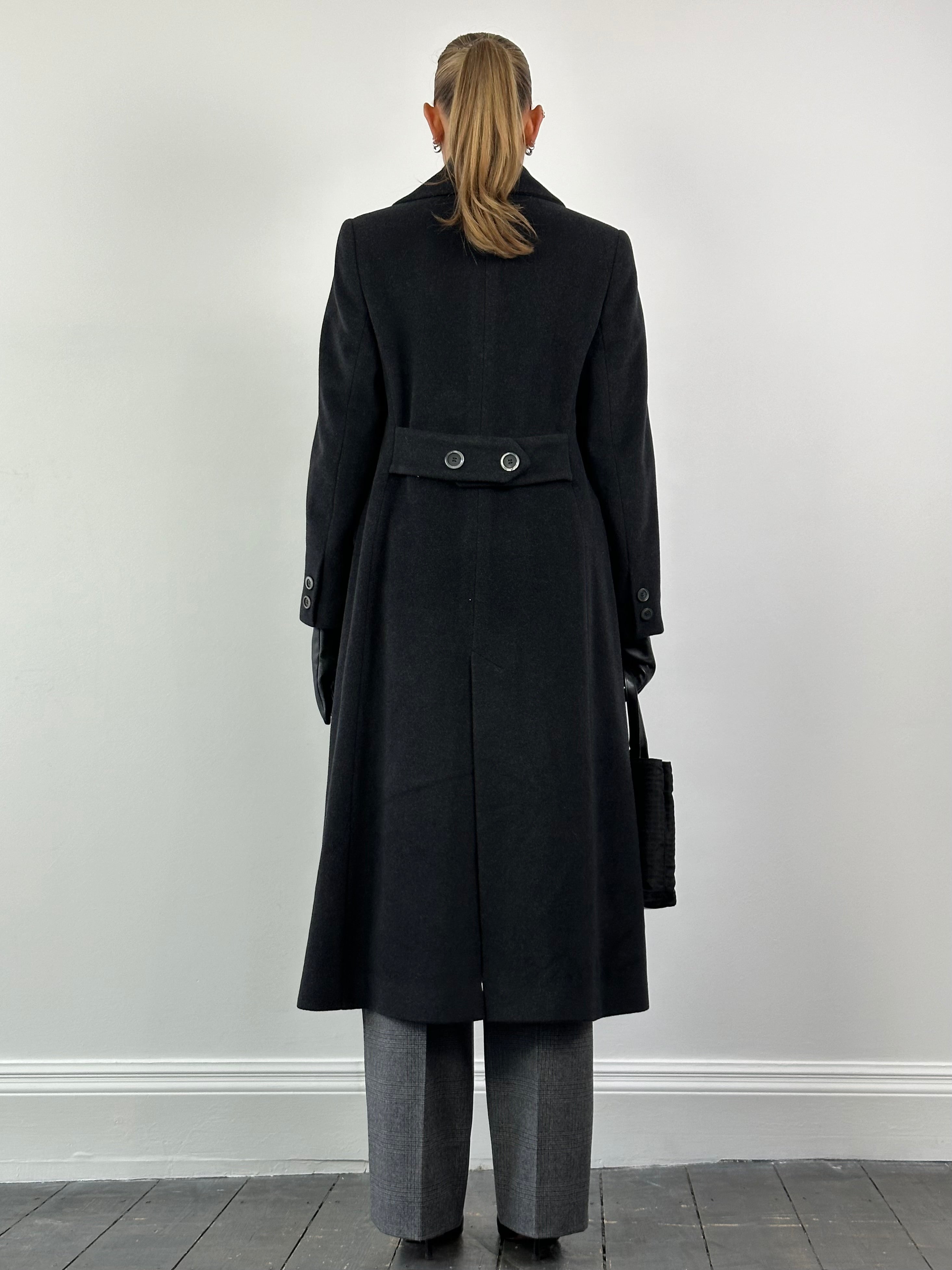 Vintage Italian vintage pure wool double-breasted floor-length coat in size M displayed on a hanger.