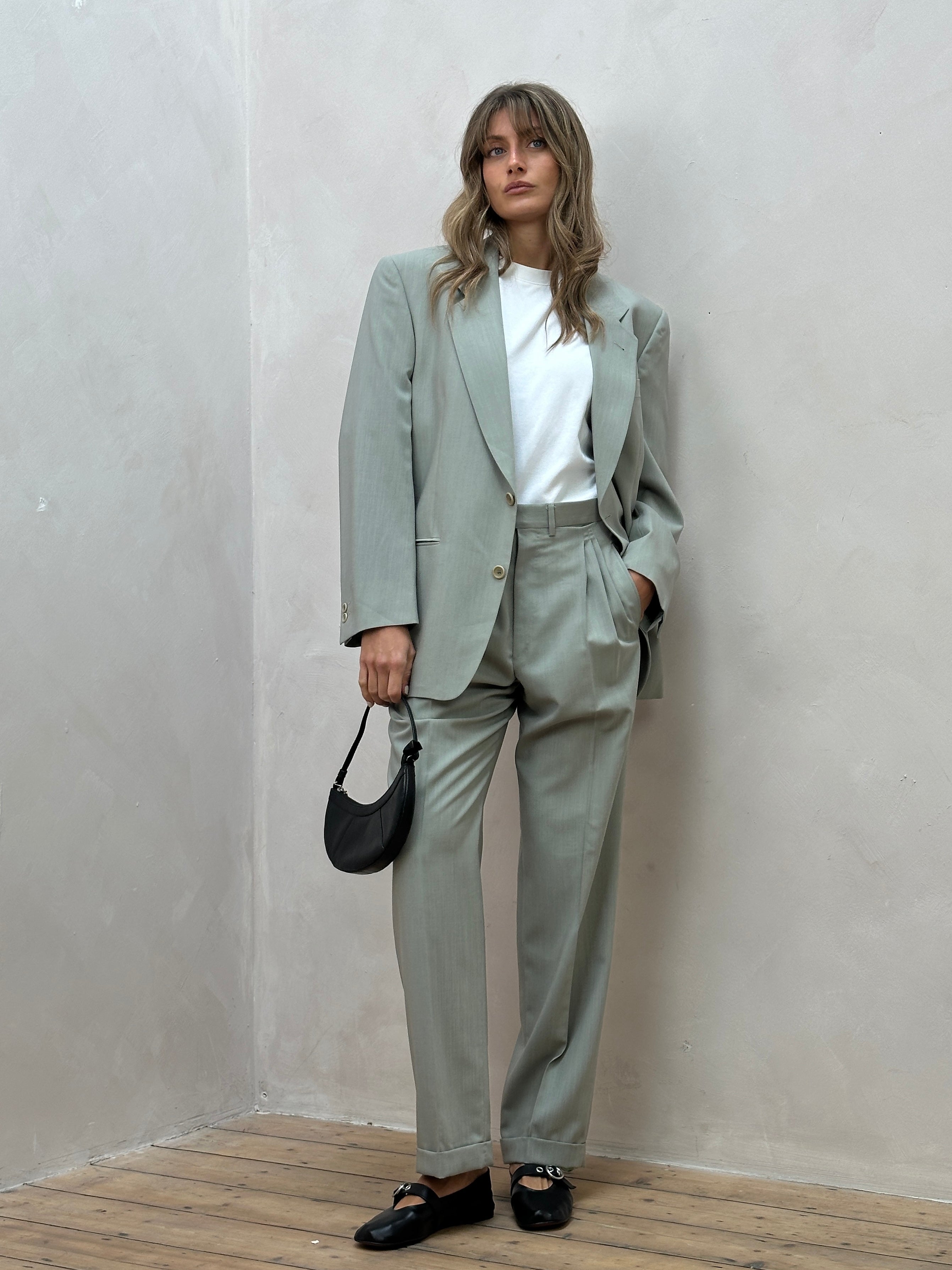 Vintage Italian vintage pure wool jumpsuit in size 38R/W30, featuring a stylish single-breasted design with classic tailoring.