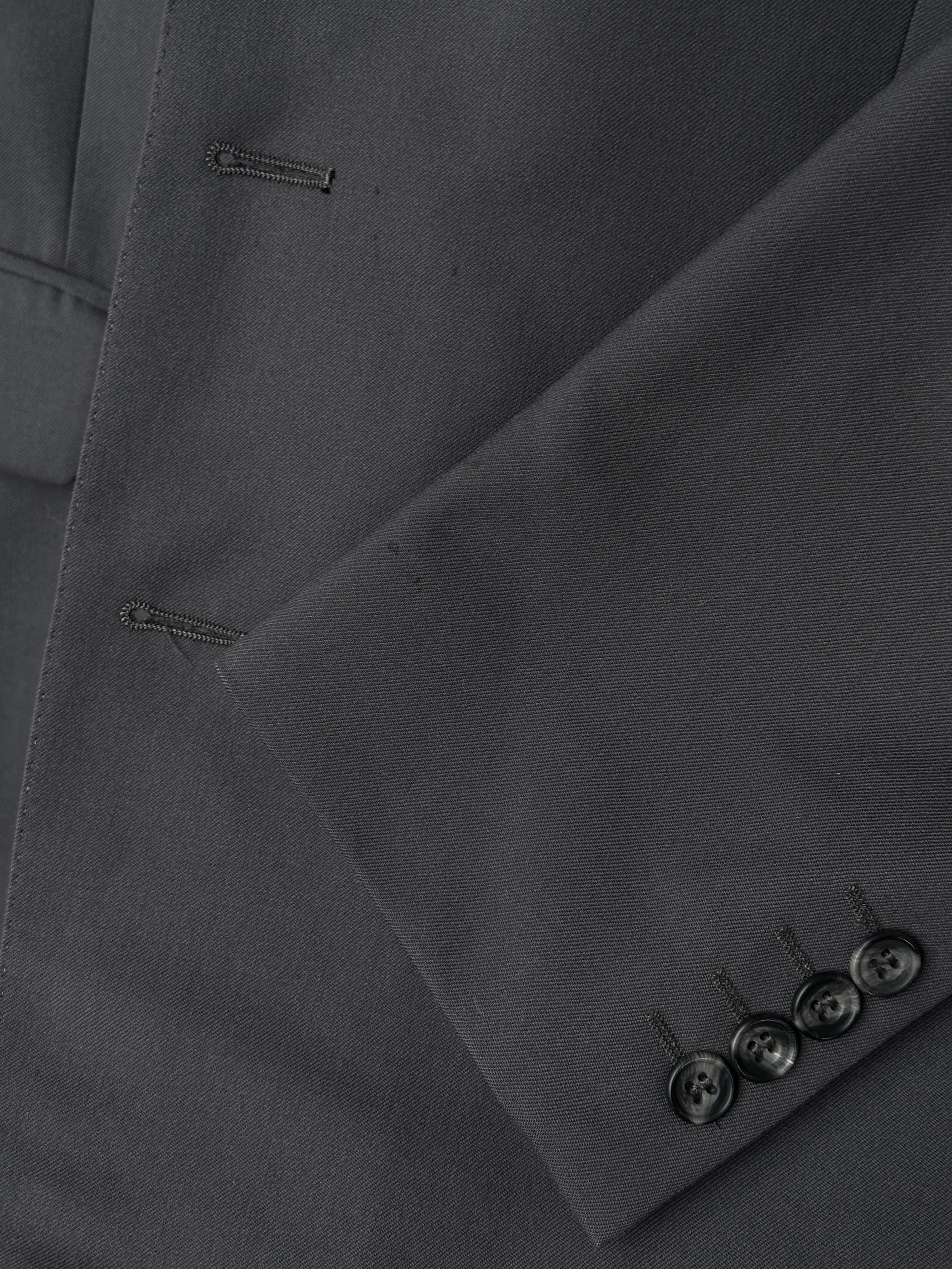 Christian Dior wool single-breasted suit jumpsuit in size 42S/W34, tailored with a sleek, structured design.