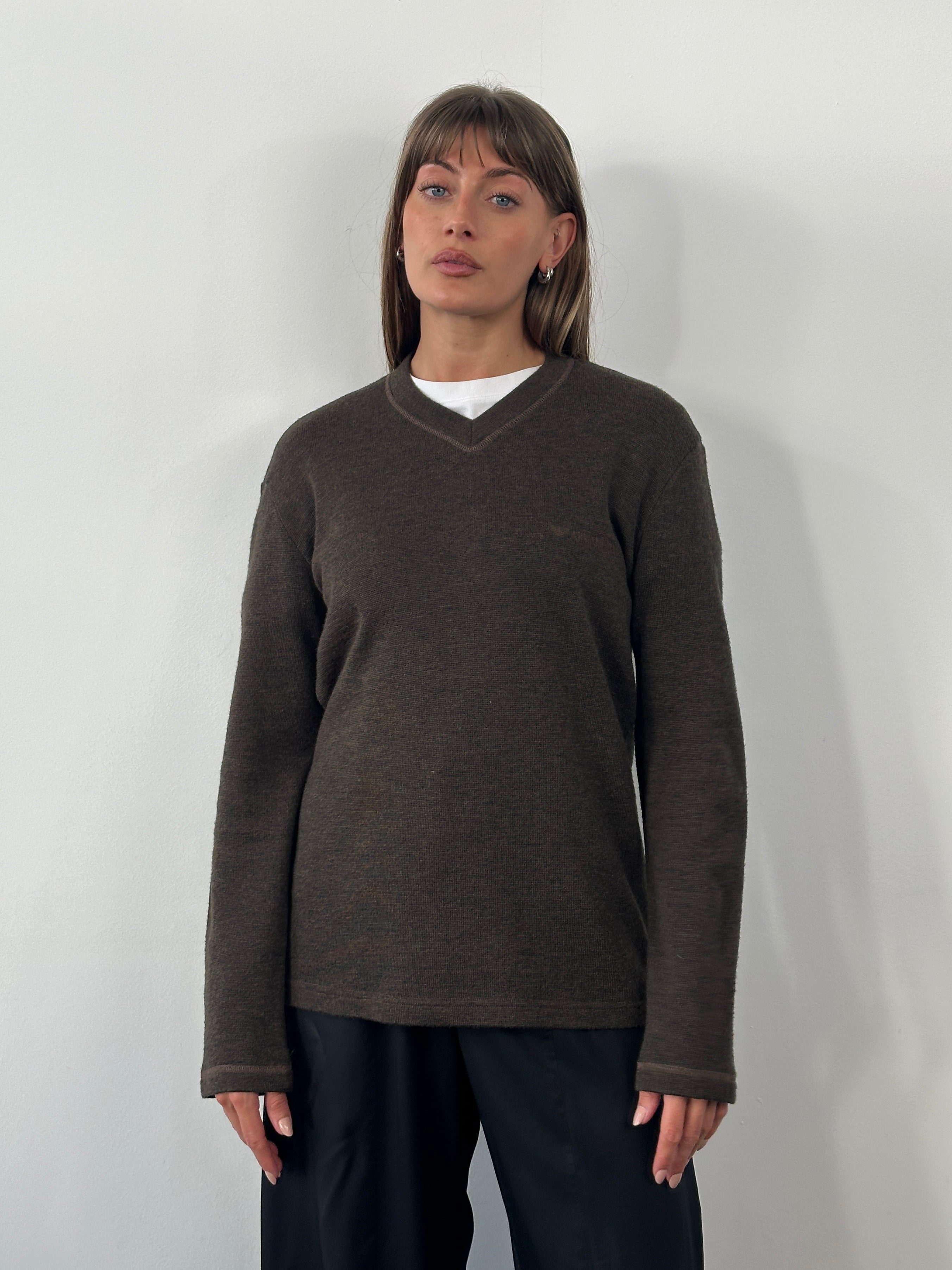 Armani Jeans 2000s wool V-neck knitted jumper in size M, featuring the iconic logo and classic design.