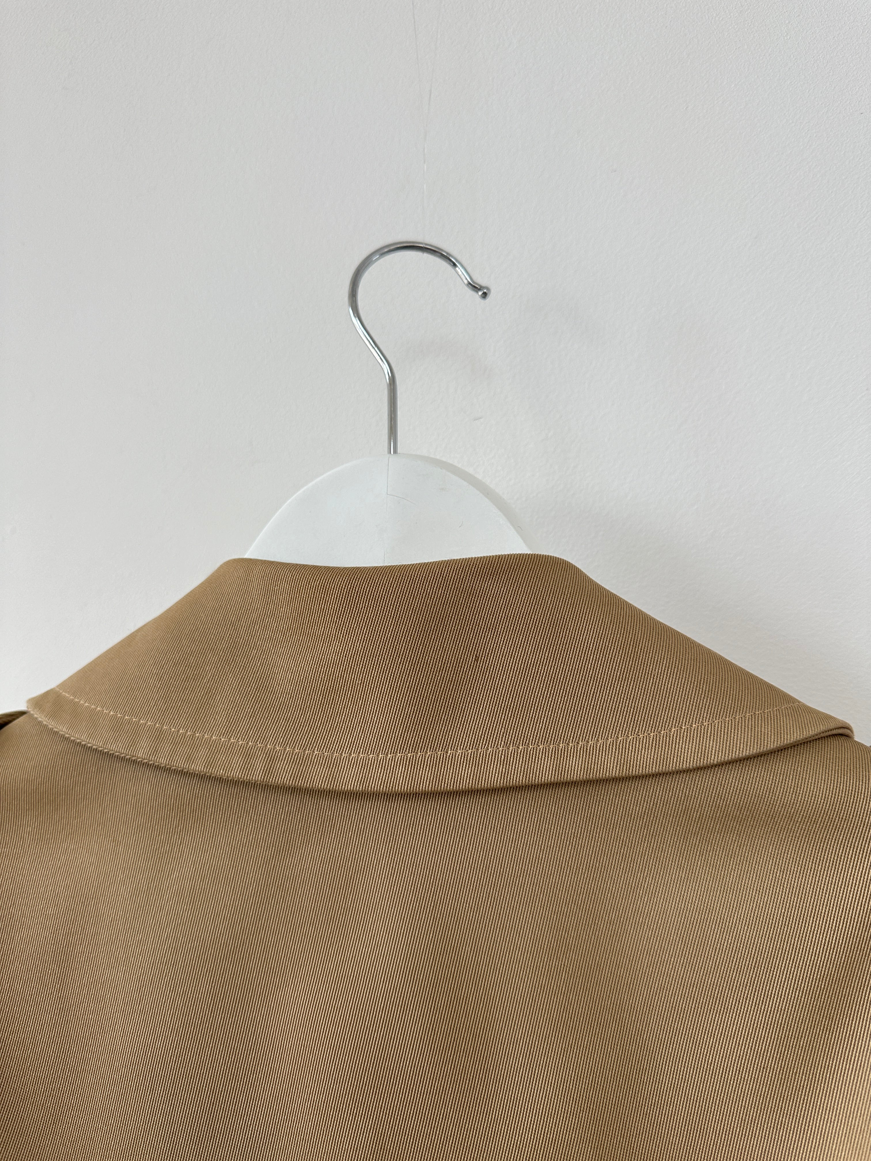 Vintage wool double-breasted trench coat in size L, classic design with lapels and buttons, stylish vintage outerwear for men.