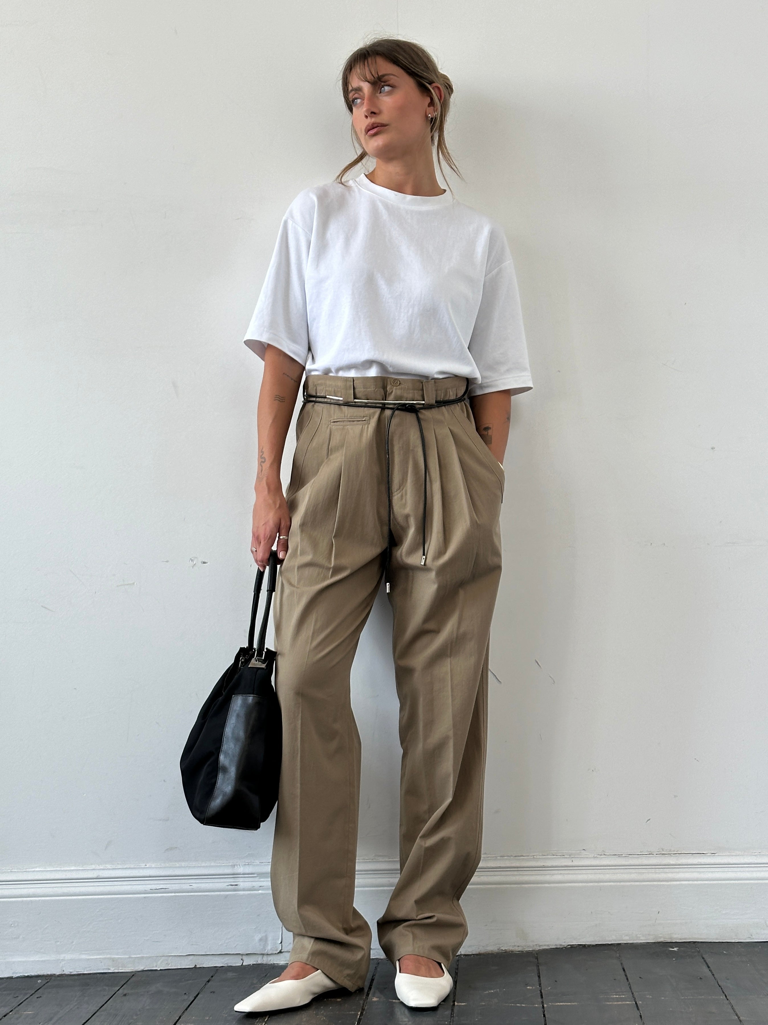 Vintage pure cotton straight-leg pleated trousers in W35 laid flat, showcasing classic style and tailored fit.