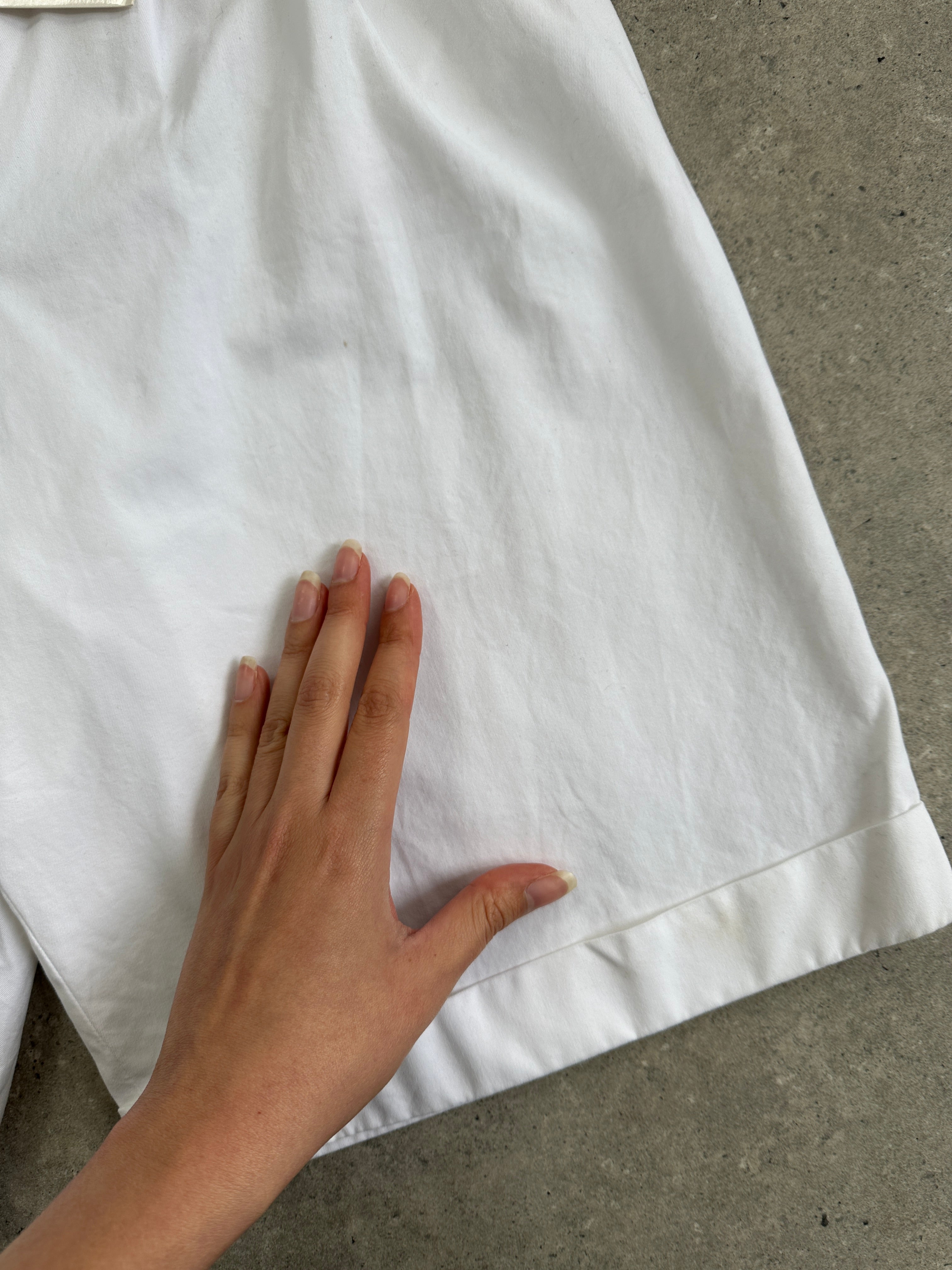 Max Mara pure cotton high-waisted Bermuda shorts in white, featuring a tailored fit and classic design.