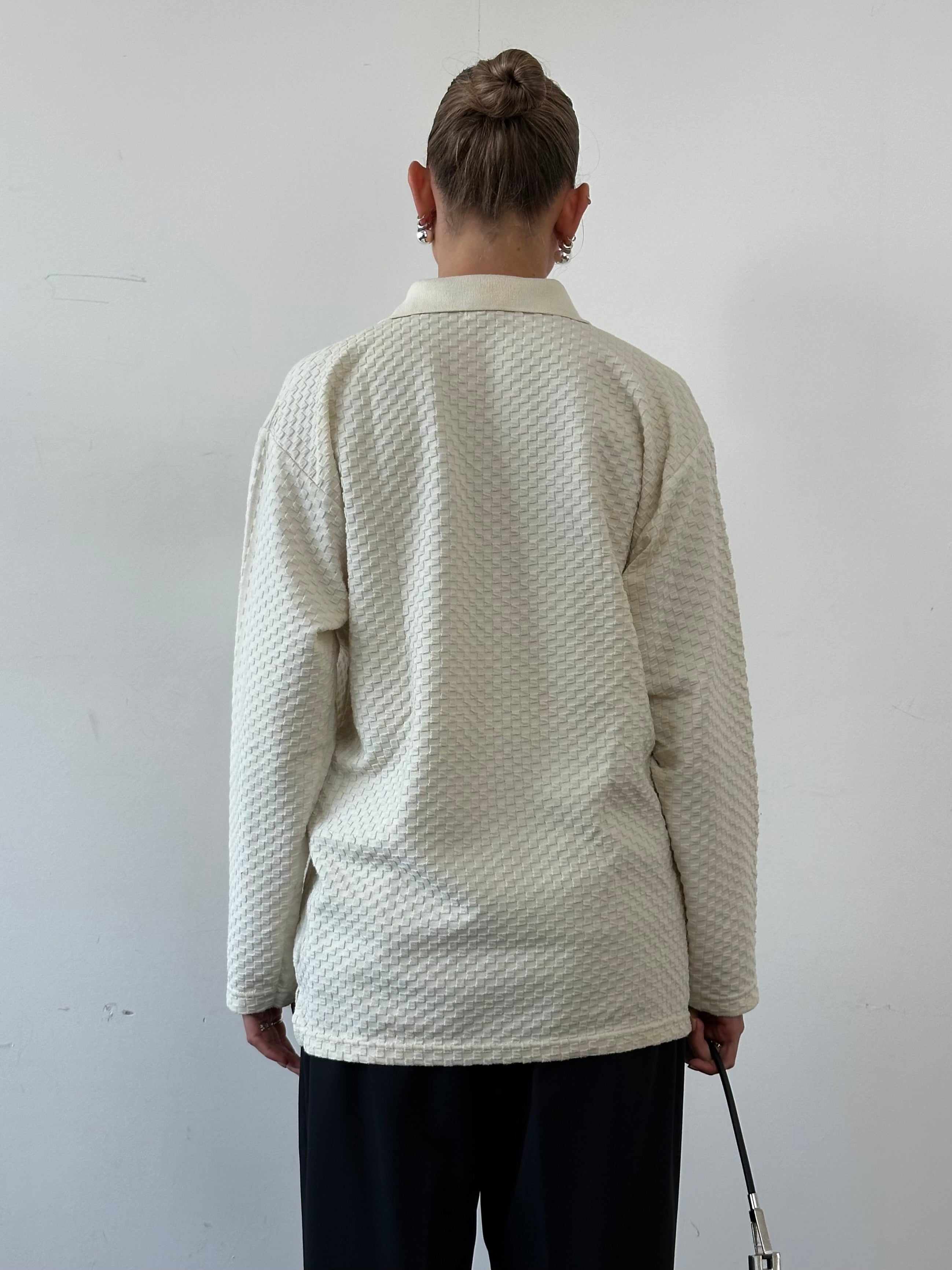 Levi’s pure cotton polo jumper with logo embroidery, size L, featuring a classic collar and ribbed cuffs and hem.