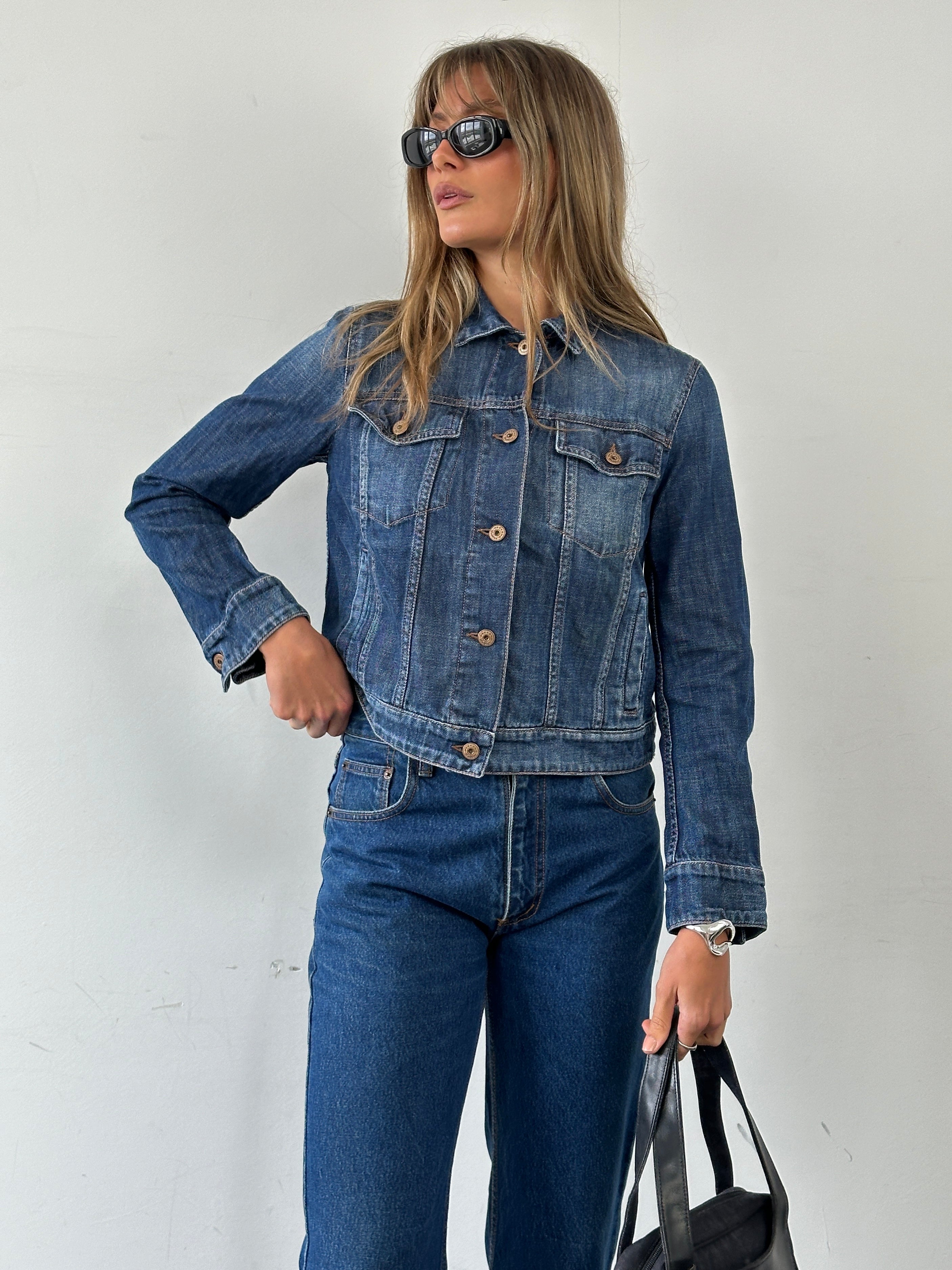 Max Mara Weekend pure cotton denim jacket in size S/M, shown in classic blue denim with button-front and collar detail.