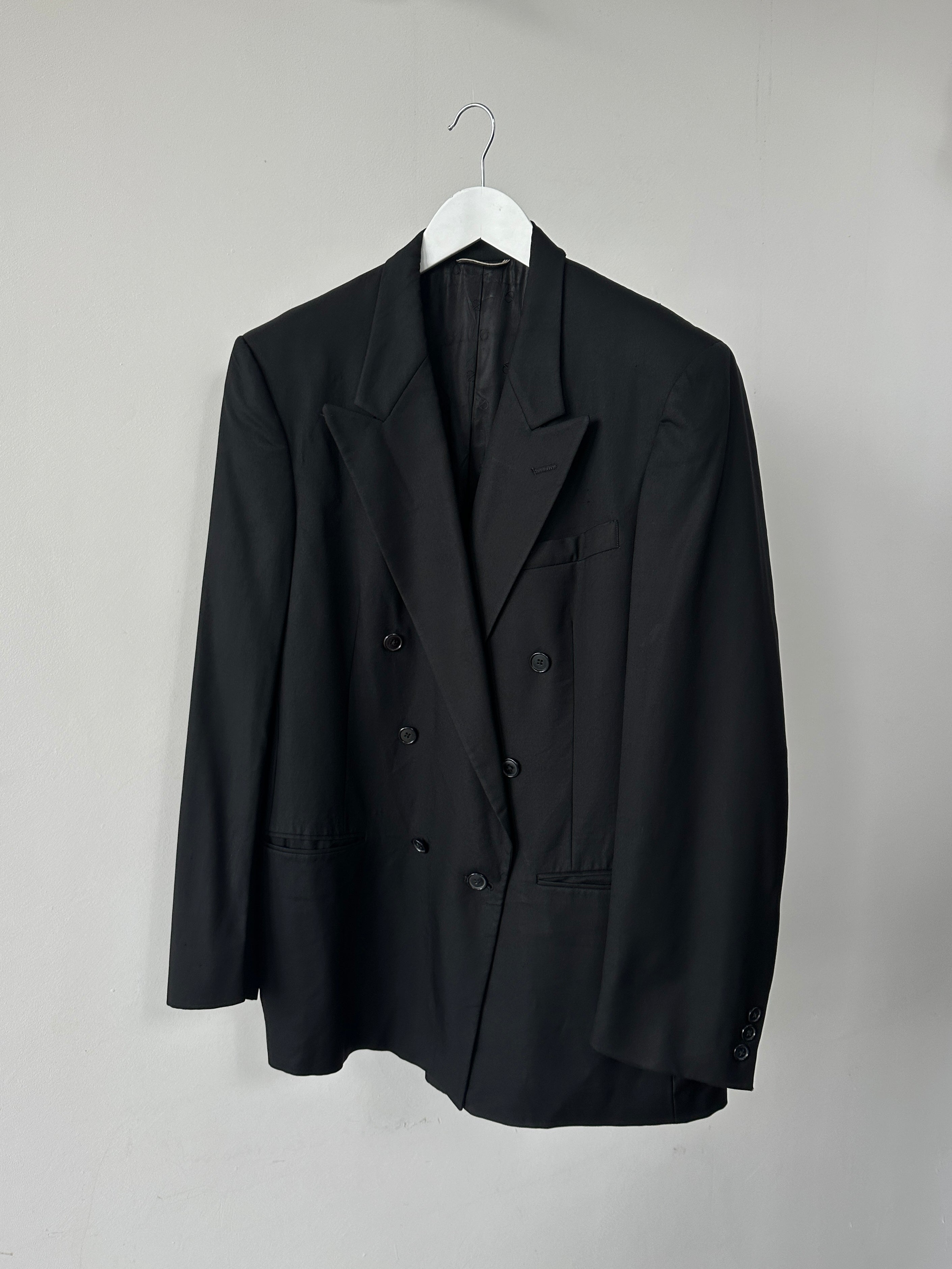 Christian Dior pure wool double-breasted blazer in size L/XL, tailored fit with classic lapels and structured design.