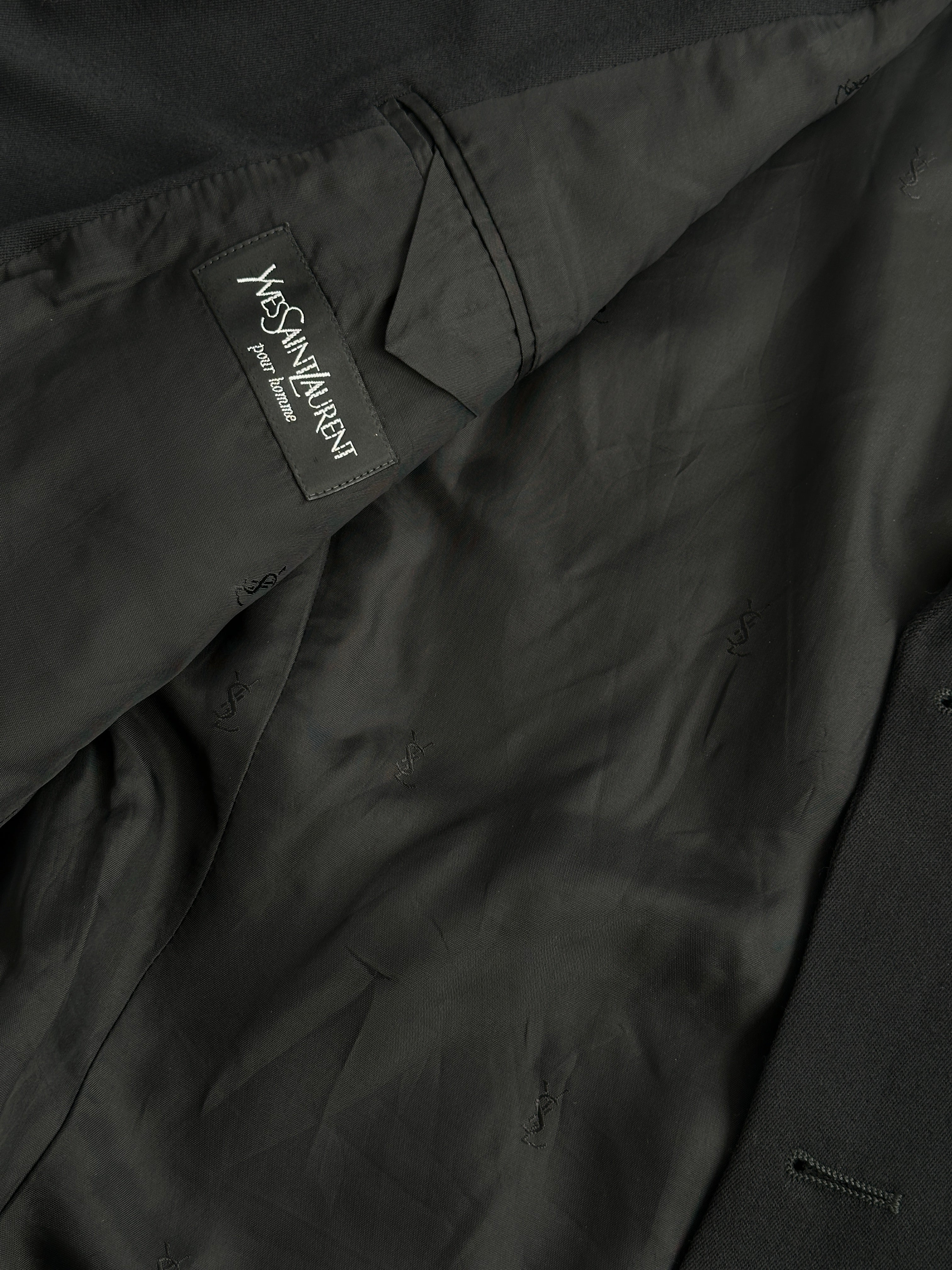Yves Saint Laurent Pour Homme 1990s pure wool single-breasted blazer in size 36R/S, shown on a hanger, navy blue color.