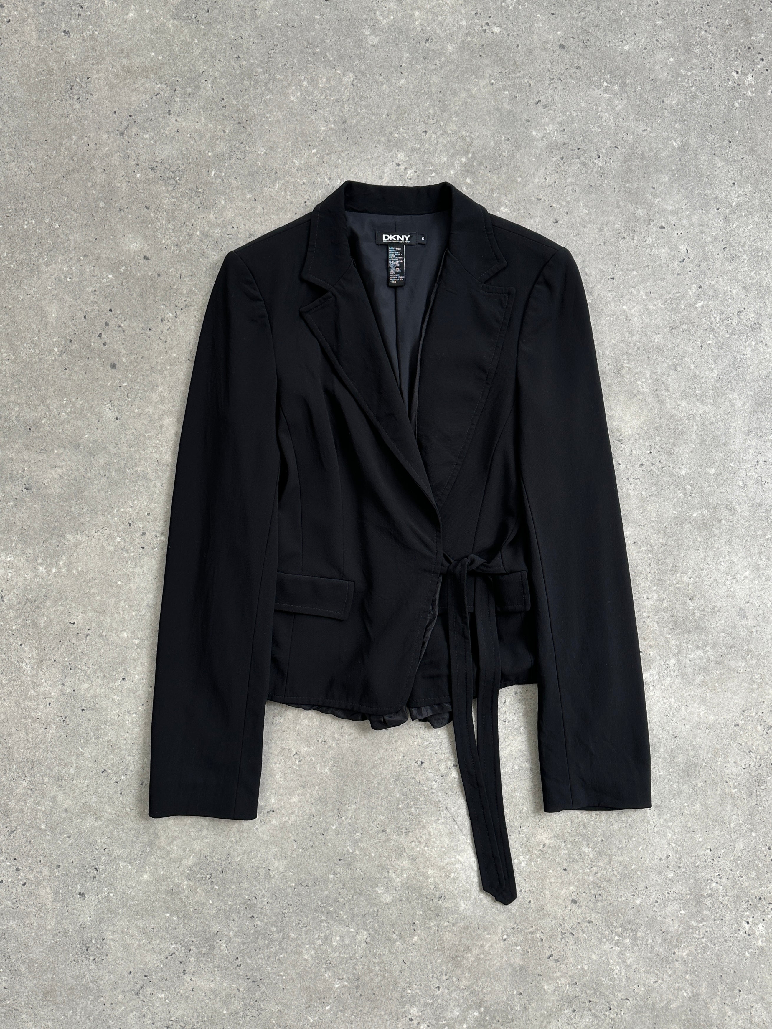 DKNY silk-trim wool wrap blazer in size S/M, shown on model, featuring tailored fit and elegant design.