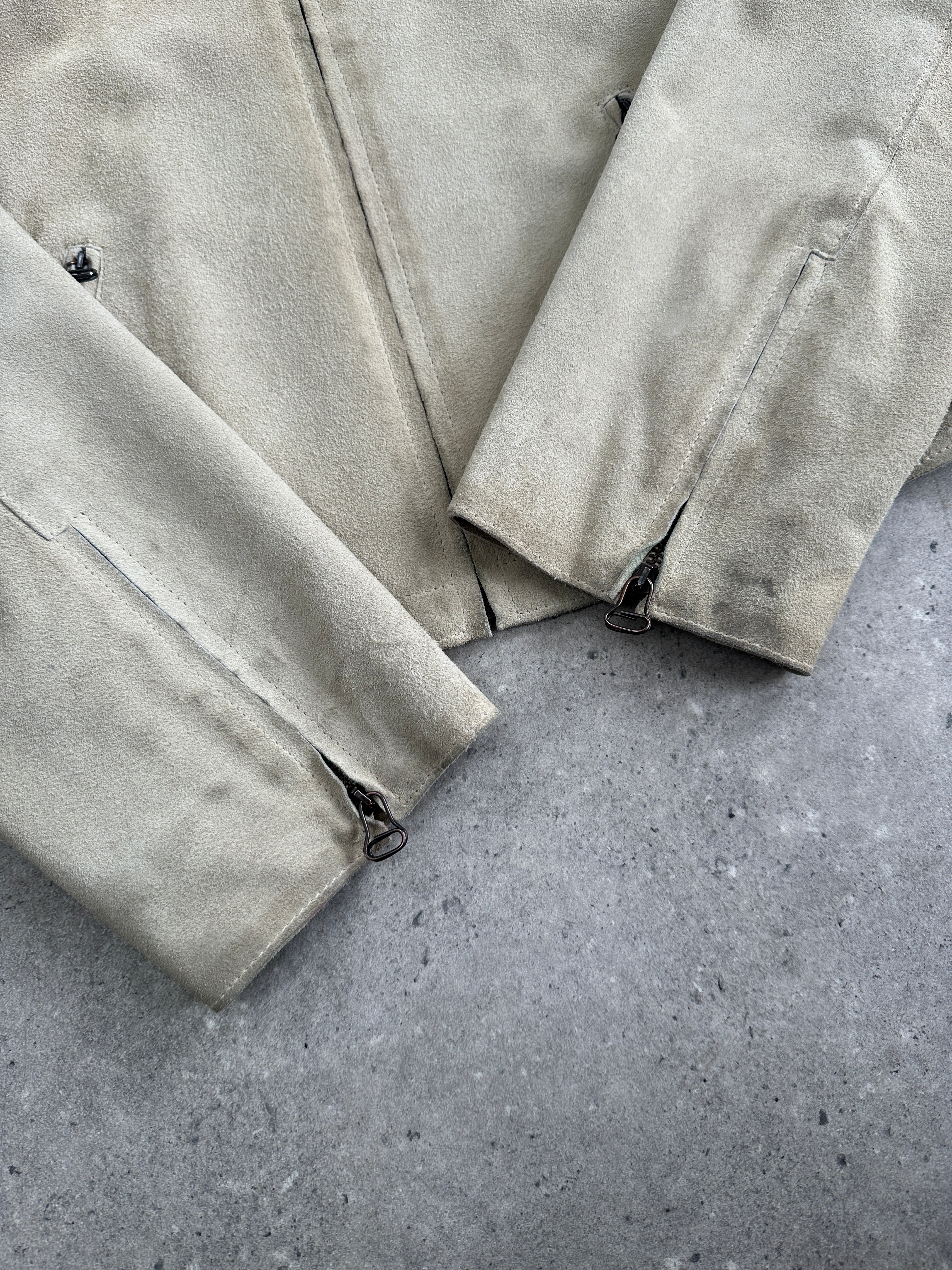 Armani Jeans fitted suede jacket in XS/S, shown in a close-up image highlighting the soft texture and stylish design.