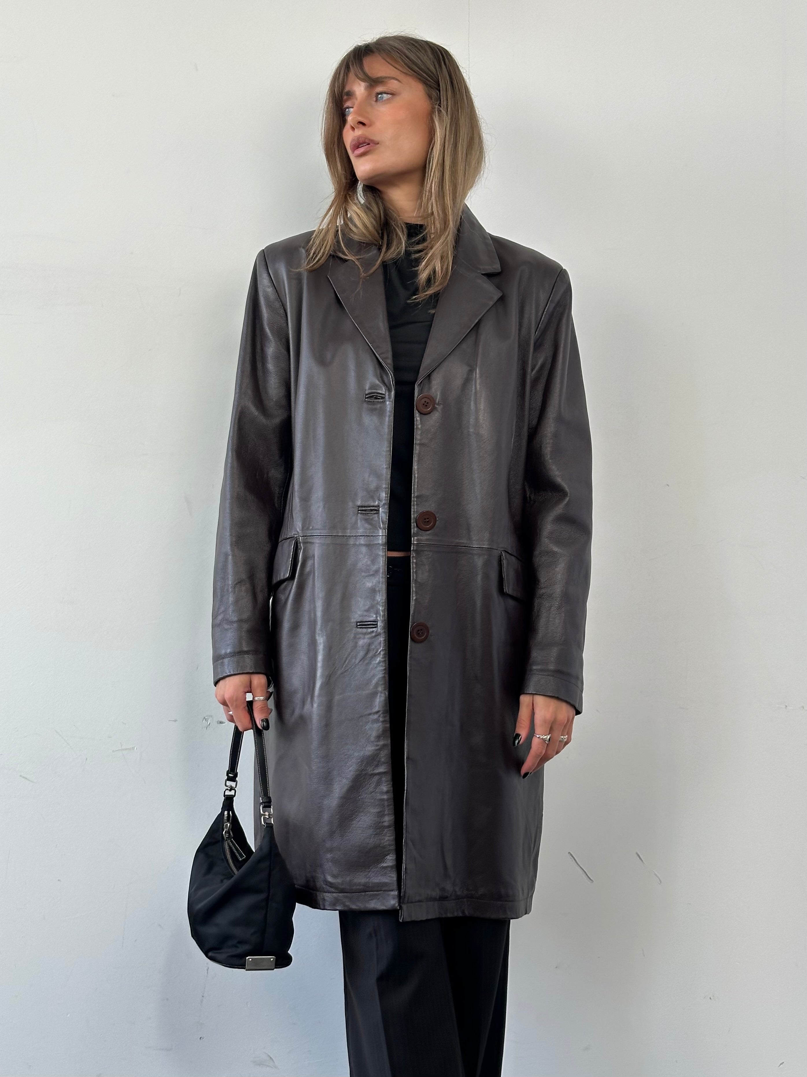 Vintage minimal leather trench coat jacket in size L, featuring classic design and smooth leather material.