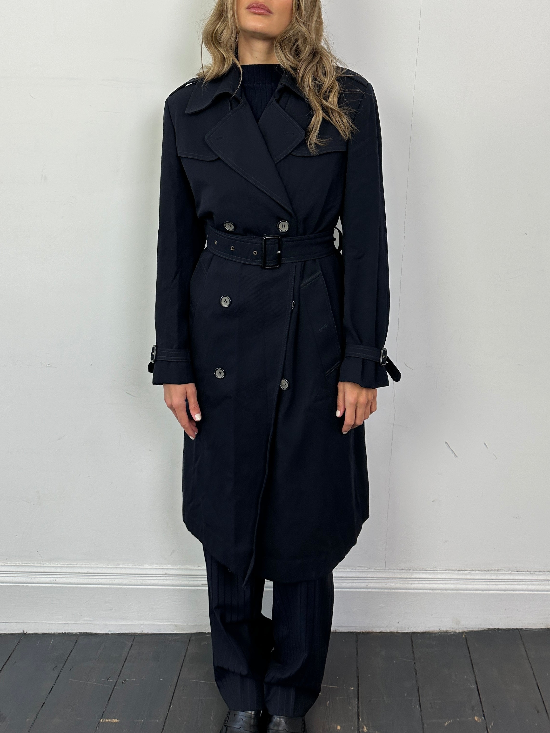 Vintage wool double-breasted belted trench coat, size small, featuring classic design and timeless style.