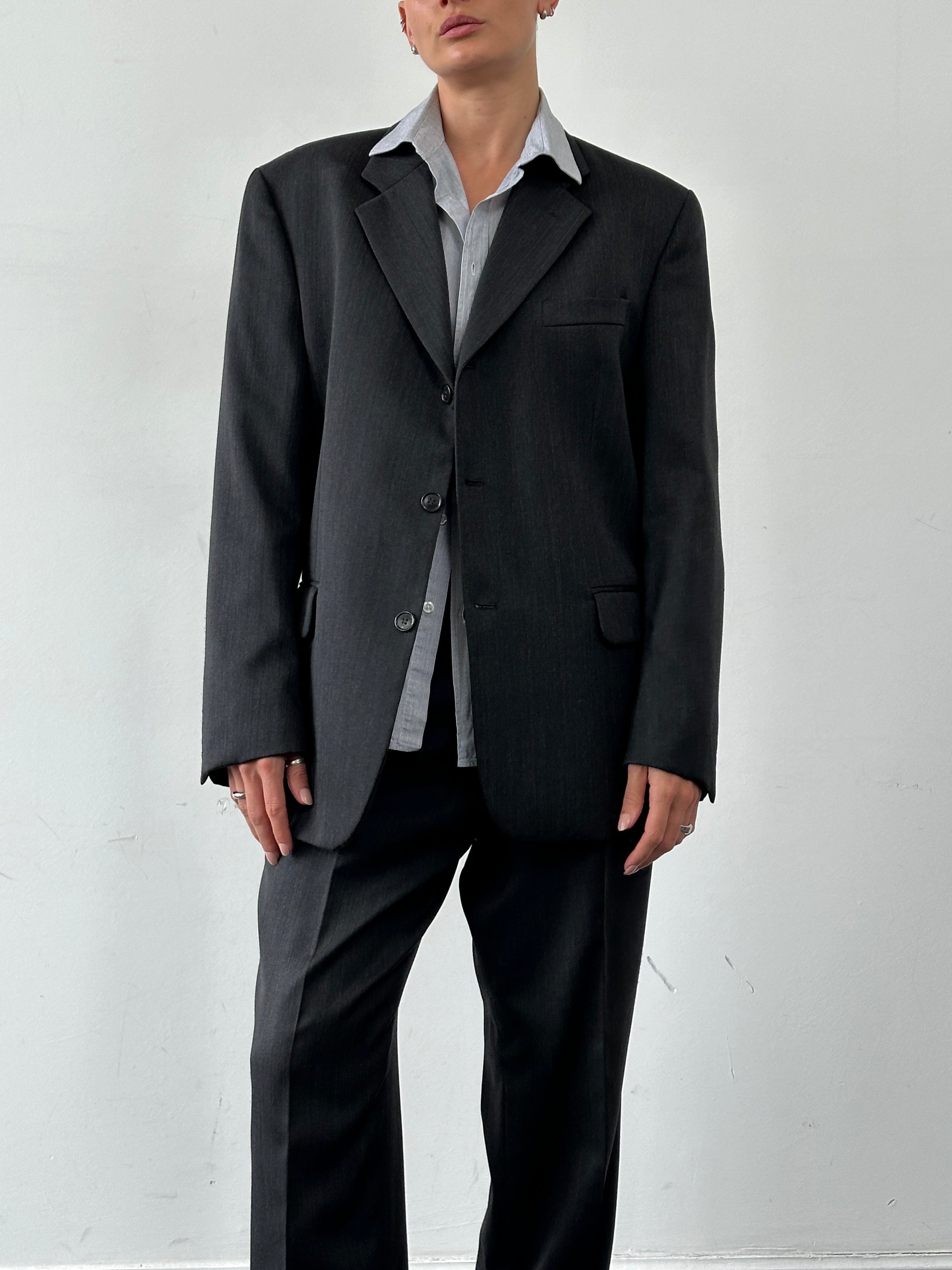 Vintage wool pinstripe single-breasted jumpsuit in size 40R/W32, featuring classic tailored design and vintage style.