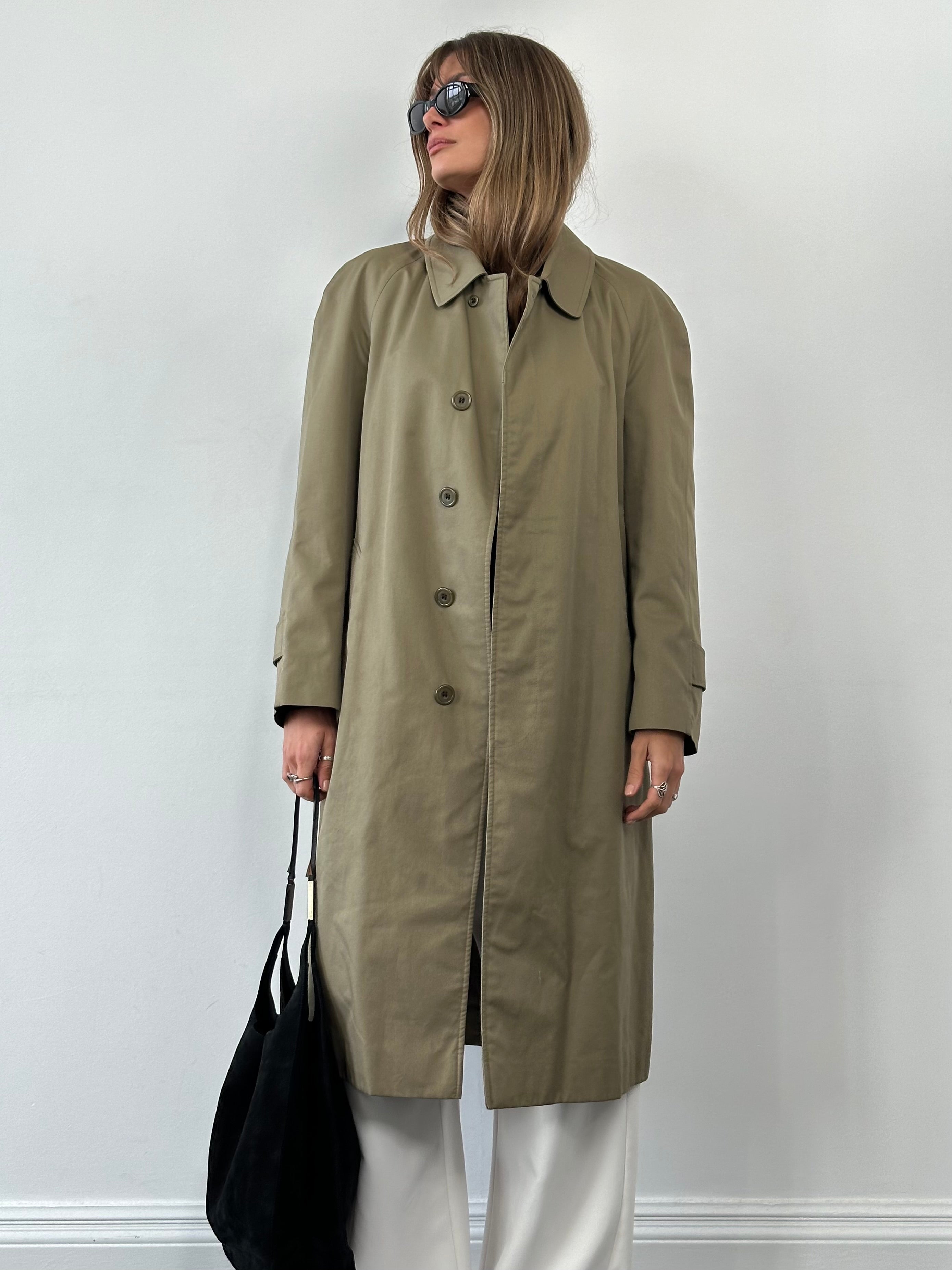 Aquascutum cotton trench coat with concealed placket in size L/XL, stylish and classic outerwear with a tailored fit.