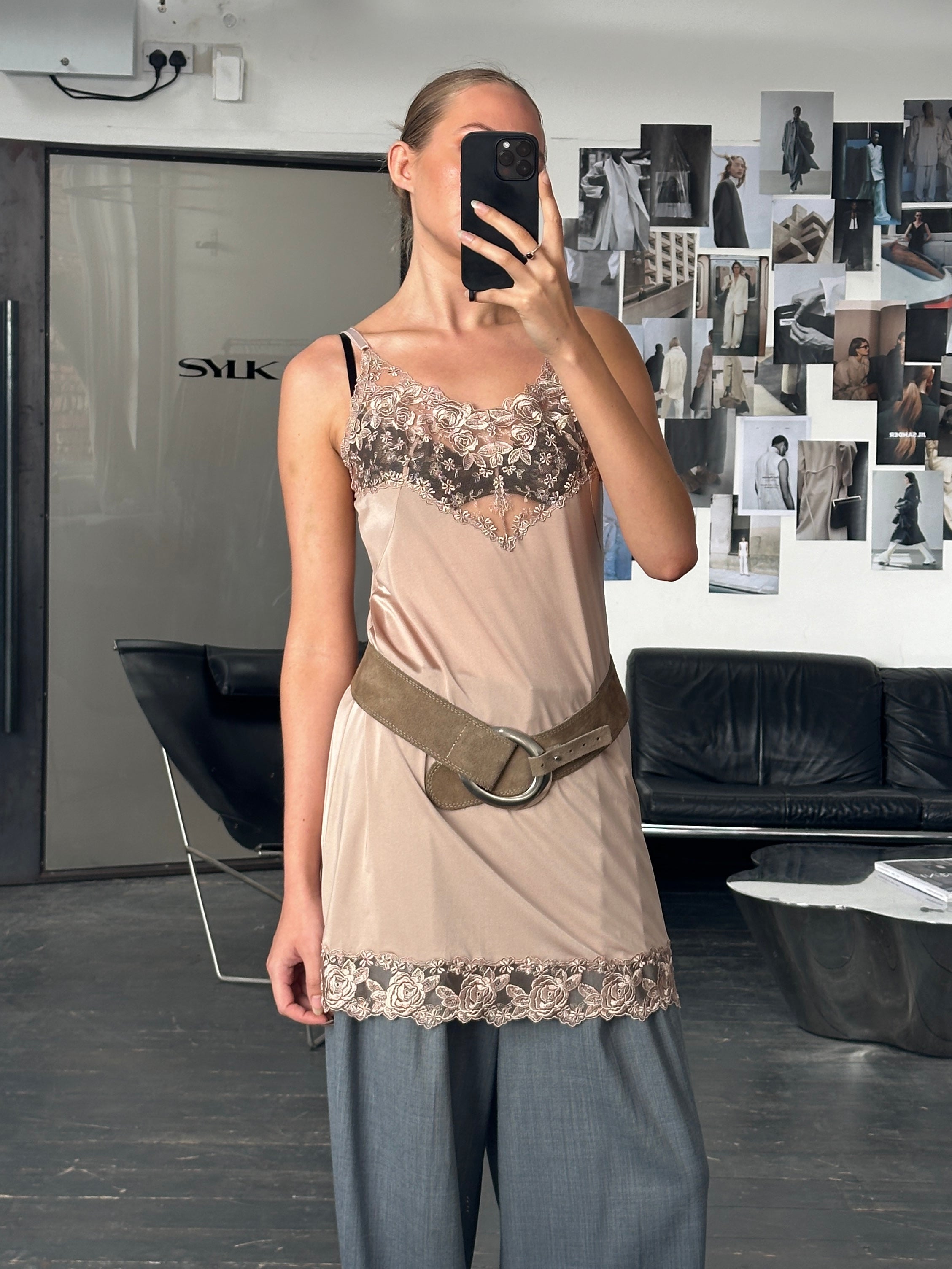 Vintage 1990s lace mini slip dress, size M, featuring delicate lace fabric and a classic vintage style.