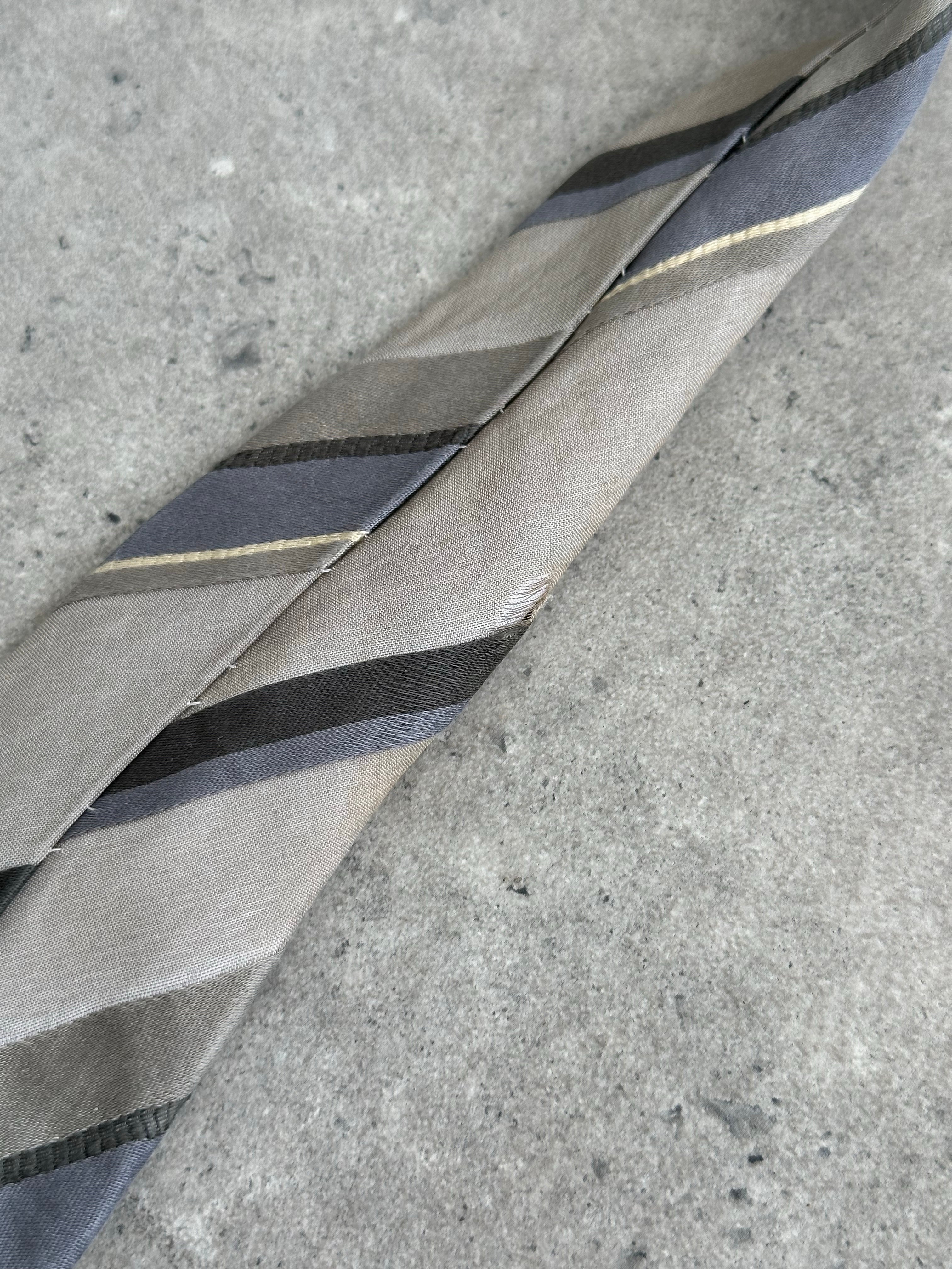 Vintage Japanese 1990s pure silk striped tie, showcasing classic patterns and rich colors, ideal for retro fashion or formal wear.