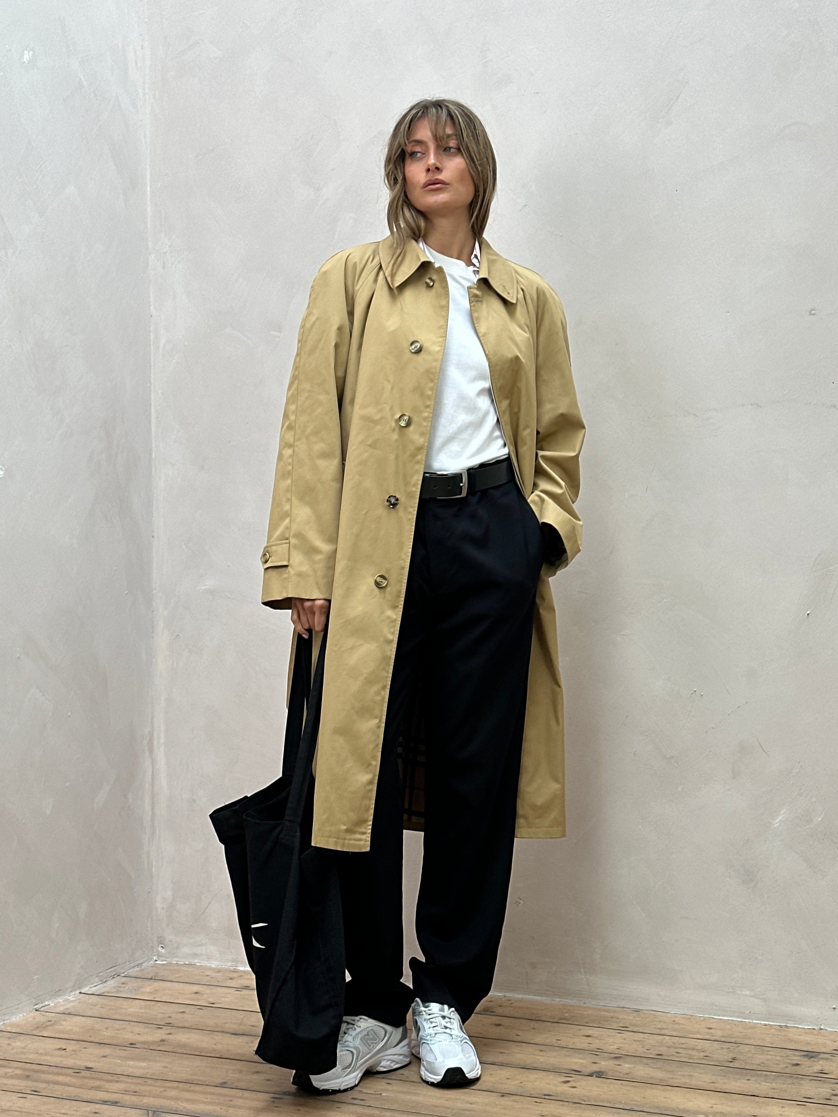 Vintage XL trench coat with concealed placket and belt, classic style, in neutral fabric, detailed front view.