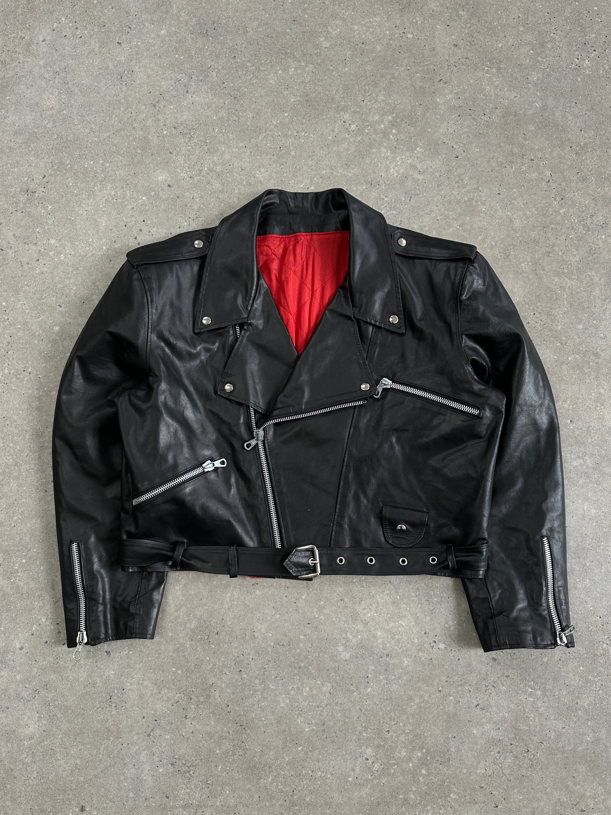 Vintage Italian vintage cropped leather biker jacket, size L, featuring classic biker style with distressed leather details.