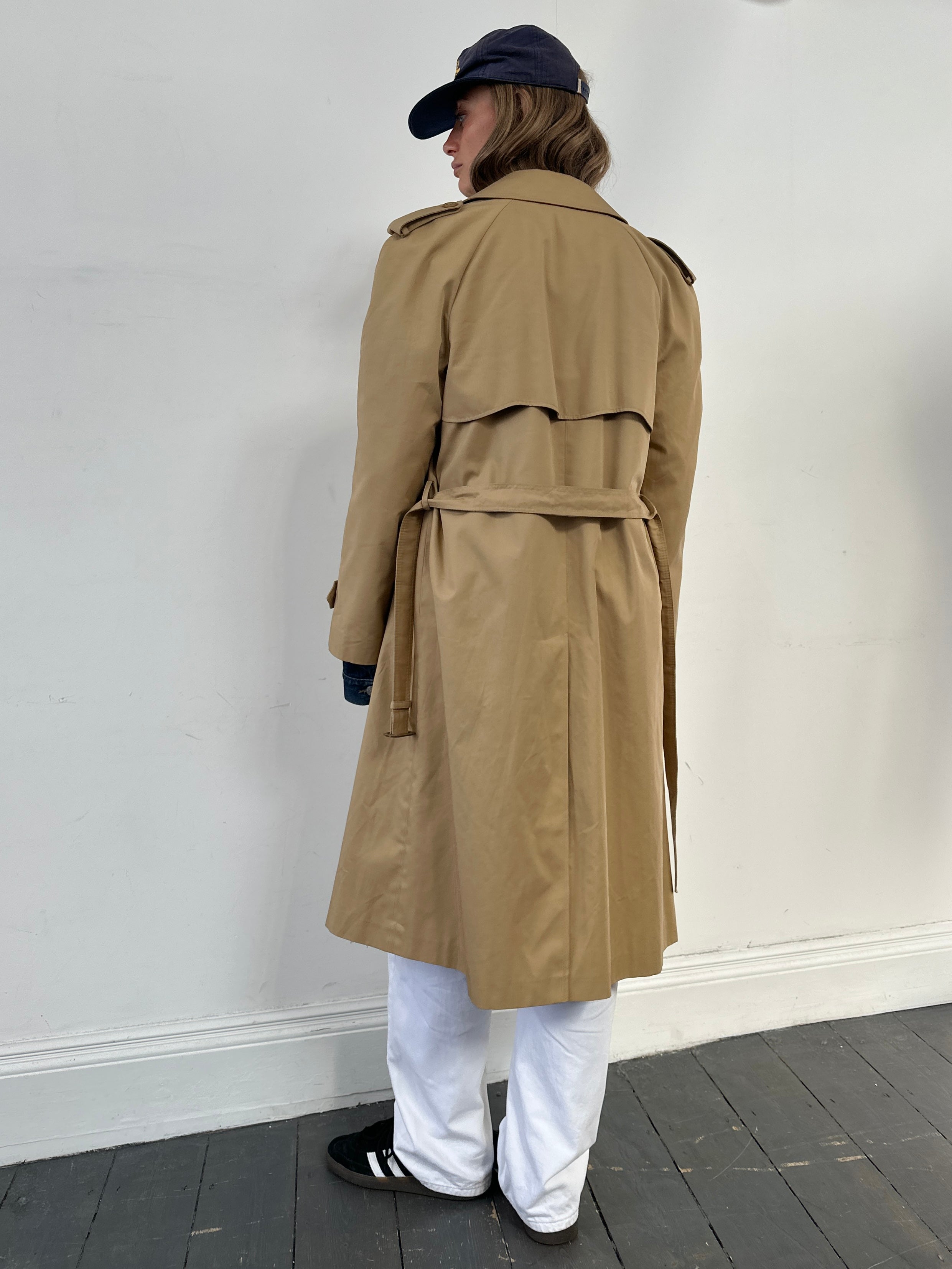 Vintage cotton double-breasted belted trench coat in size L, featuring classic design and timeless style.