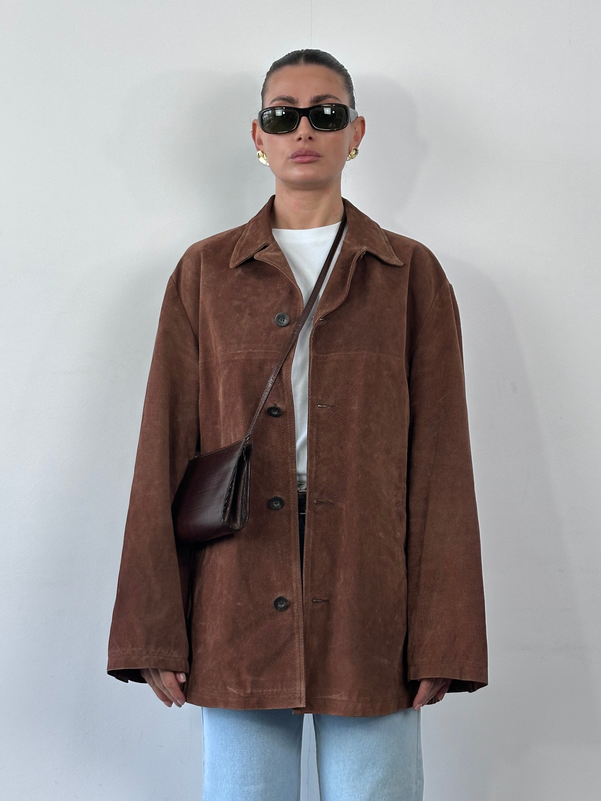 Vintage leather suede jacket in XL size with classic design, featuring soft suede material and stylish detailing.