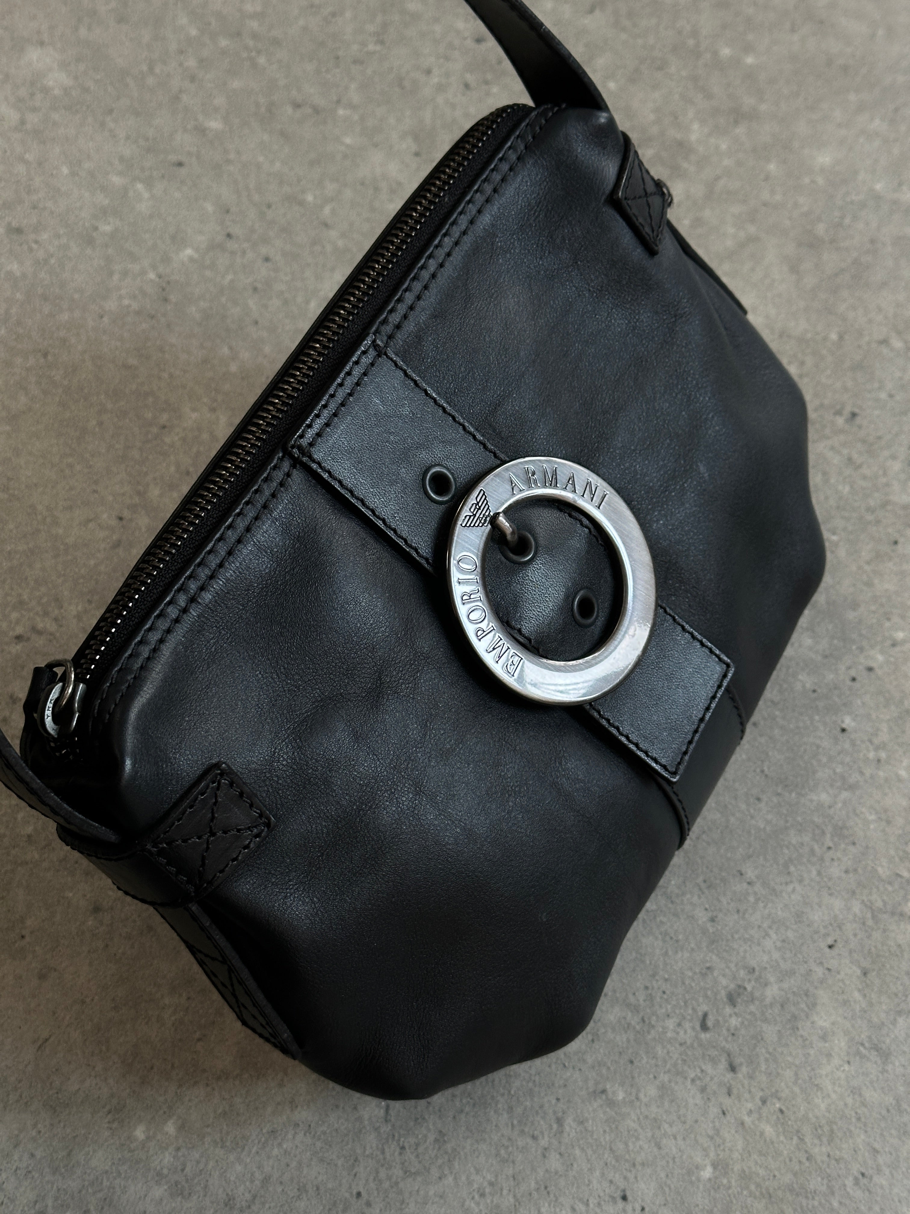 Emporio Armani leather shoulder bag from the 2000s with sleek design and adjustable strap, featuring the Armani logo.