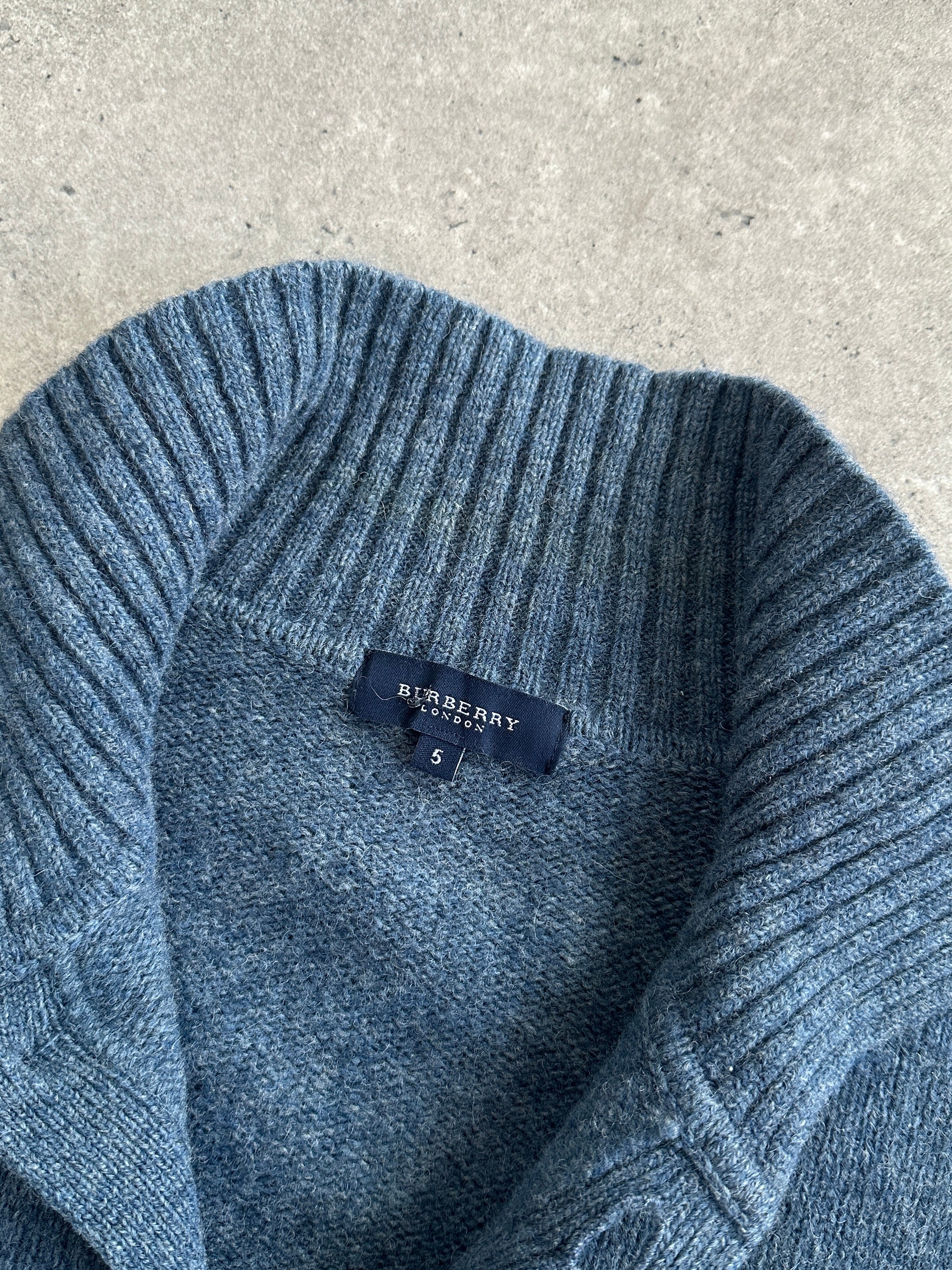 Burberry London wool knitted logo cardigan in size M/L, featuring a classic design with the Burberry logo.