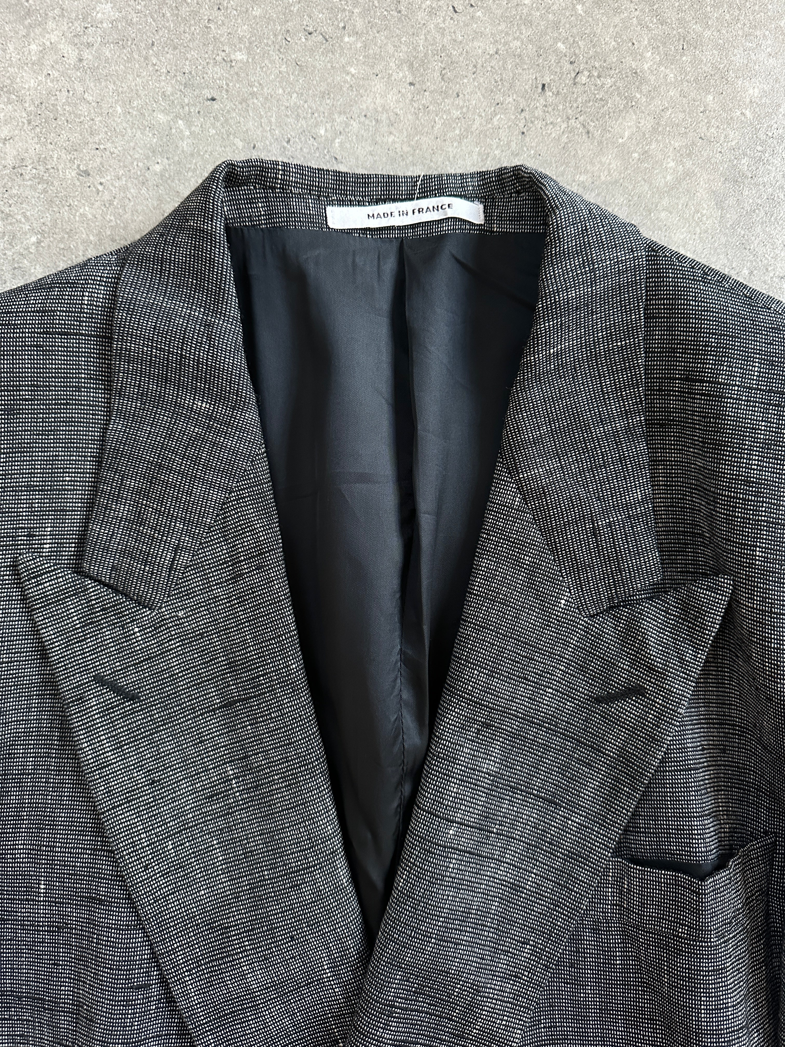 Yves Saint Laurent men's 1980s double-breasted blazer in size 38R/M, shown in a classic dark fabric with structured tailoring.