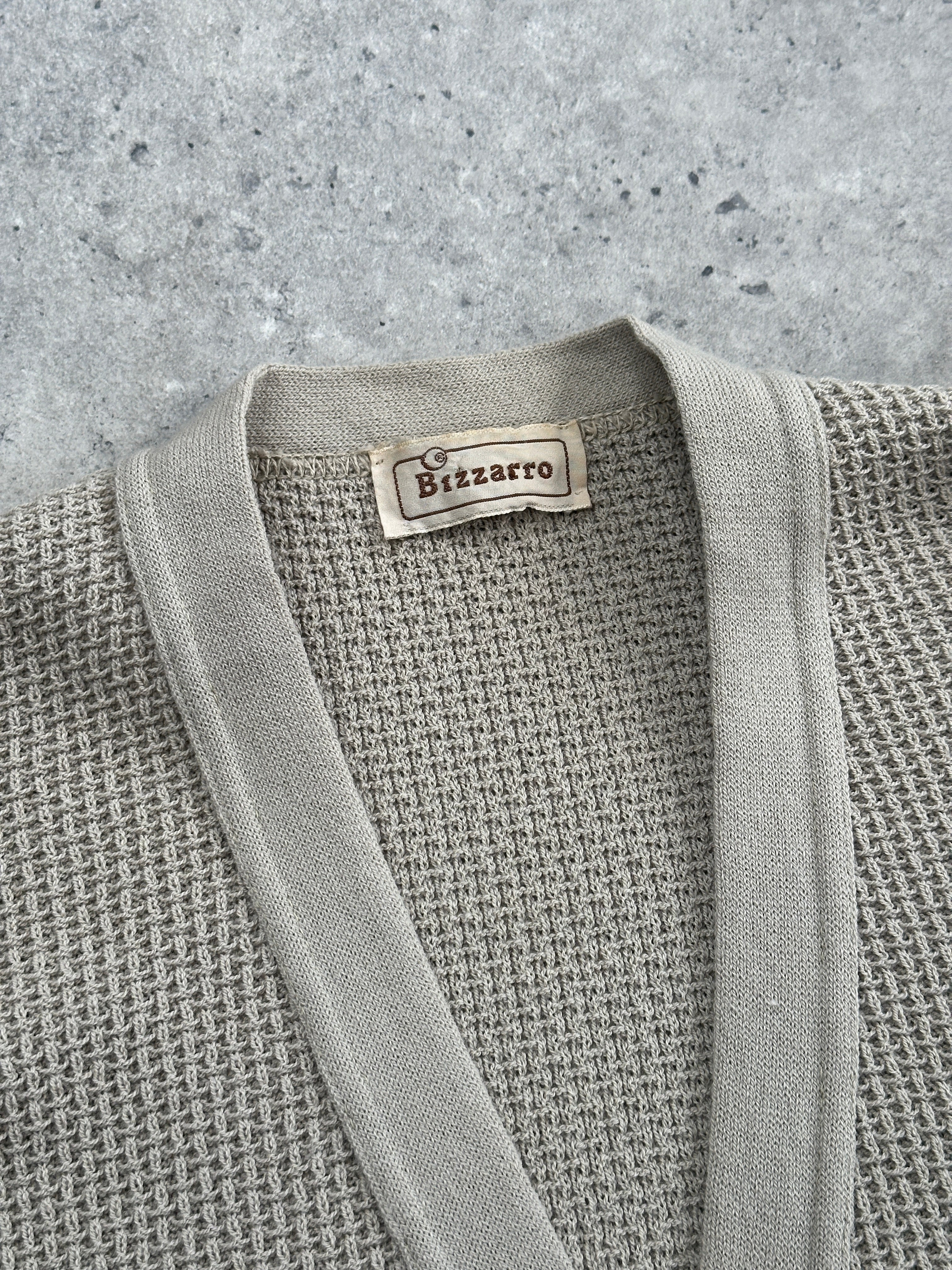 Vintage Pure Wool Knitted Cardigan in size S, featuring a cozy, textured knit pattern and classic design.