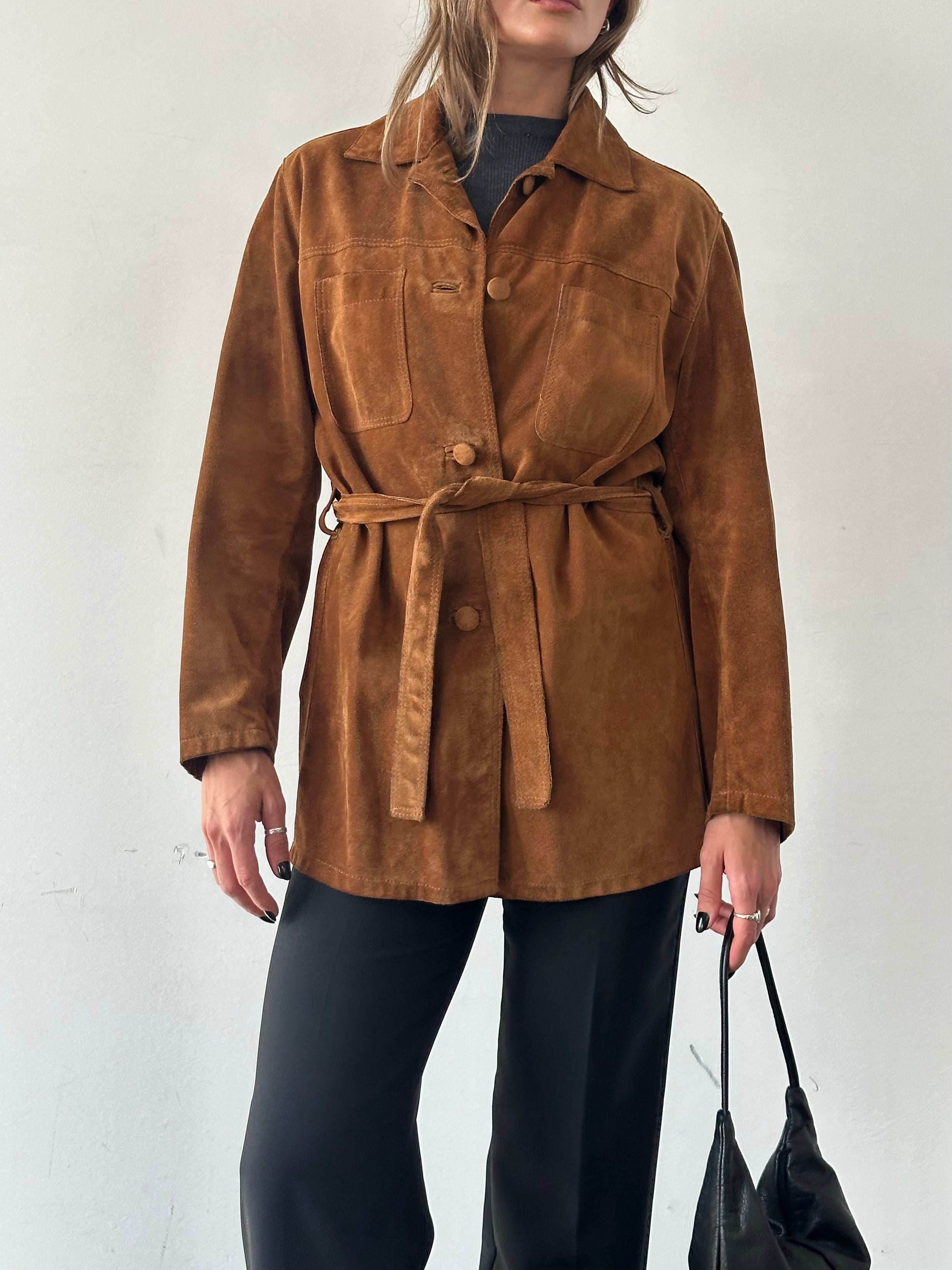 Vintage Italian belted suede jacket in size M/L, featuring a classic design with a waist belt and soft suede texture.